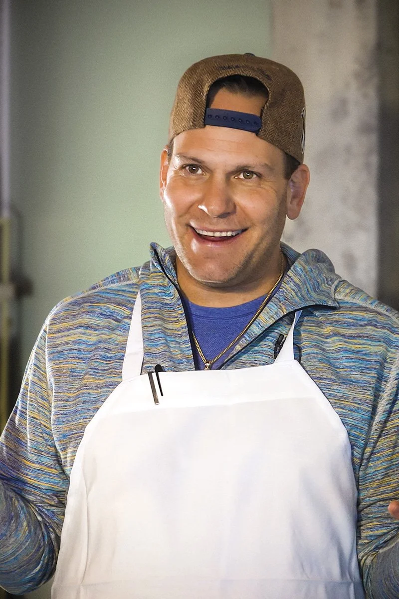 Portrait of Sean Gunbil, Founder and CEO of The Grecian Grazer