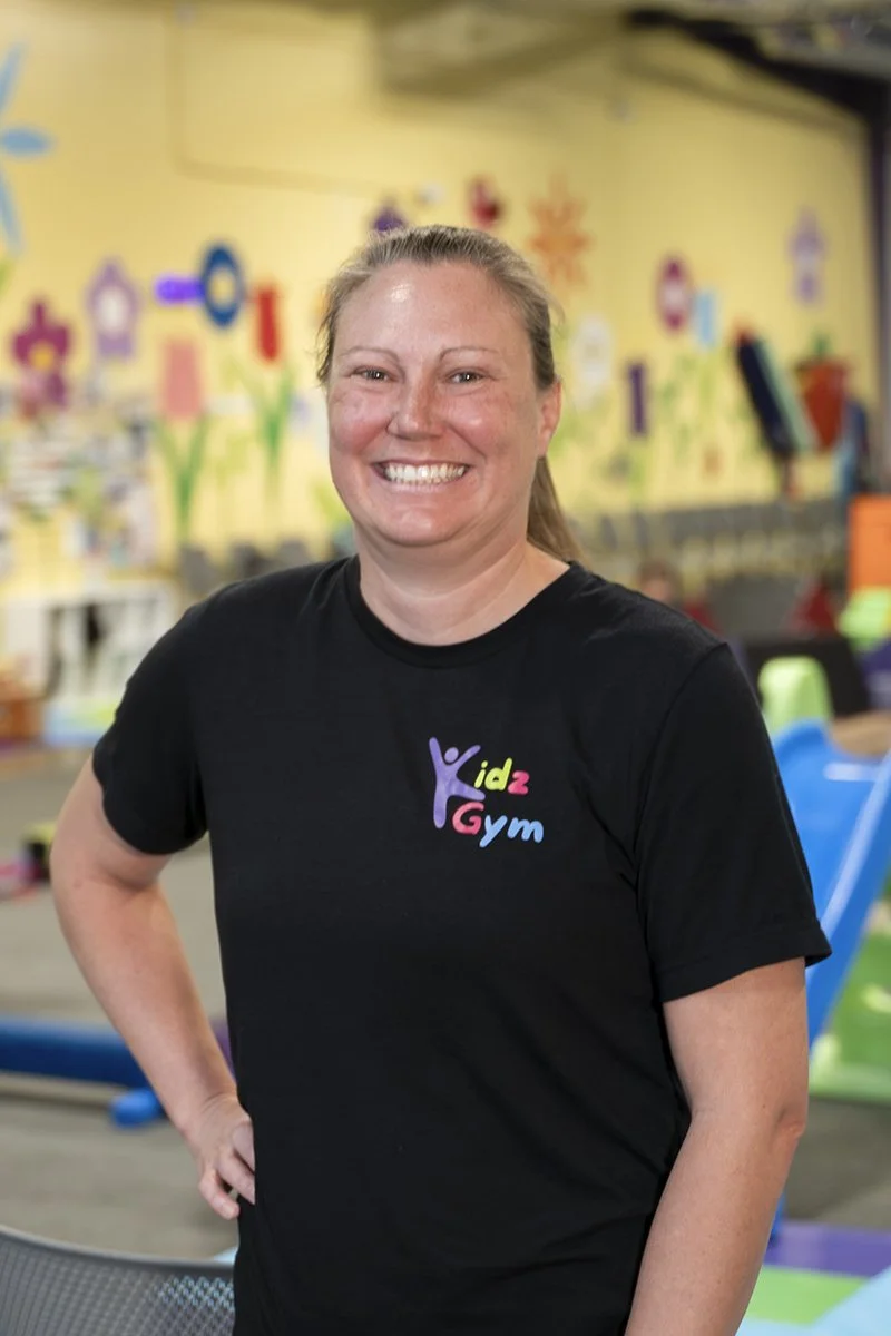 Jessica Lankes posing for a portrait inside Kids Gym