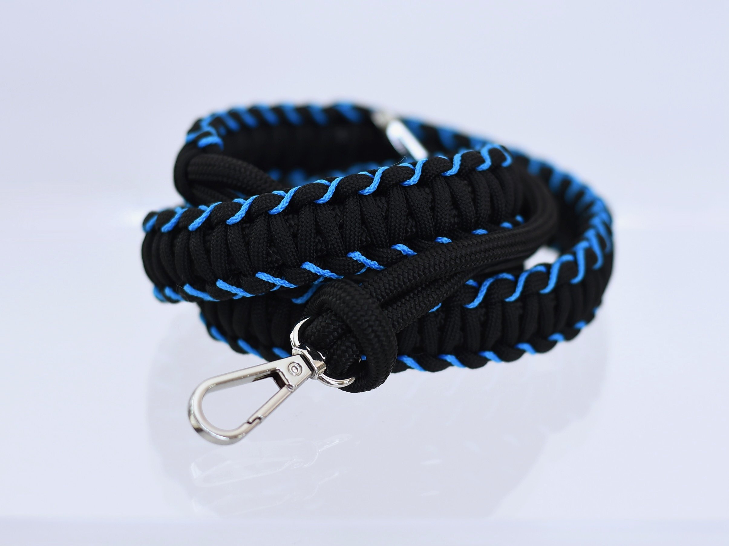 Colorful handwoven straps for bags in vibrant patterns and sports team colors.