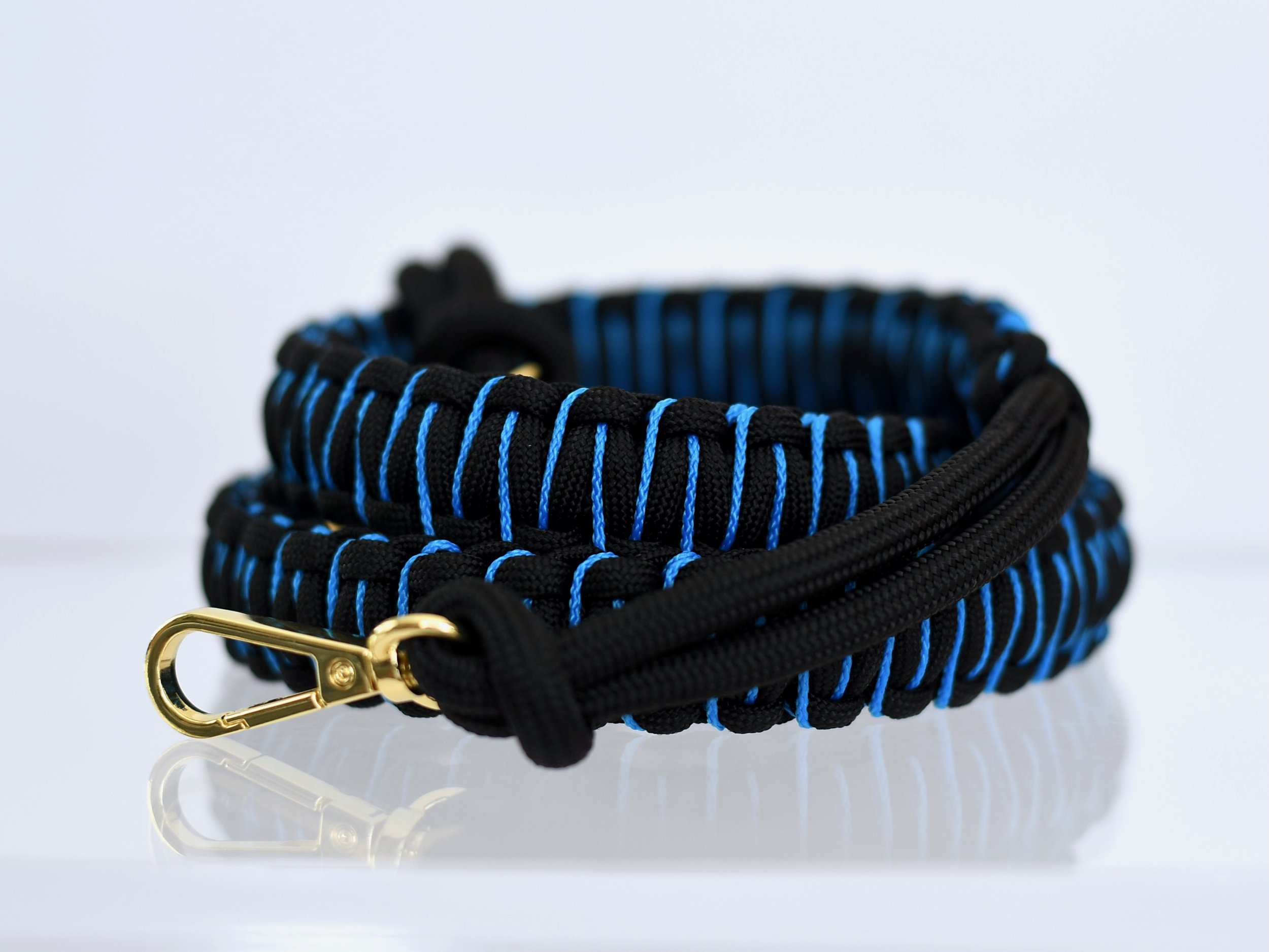 Colorful handwoven straps for bags in vibrant patterns and sports team colors. Carolina Panthers bag strap.