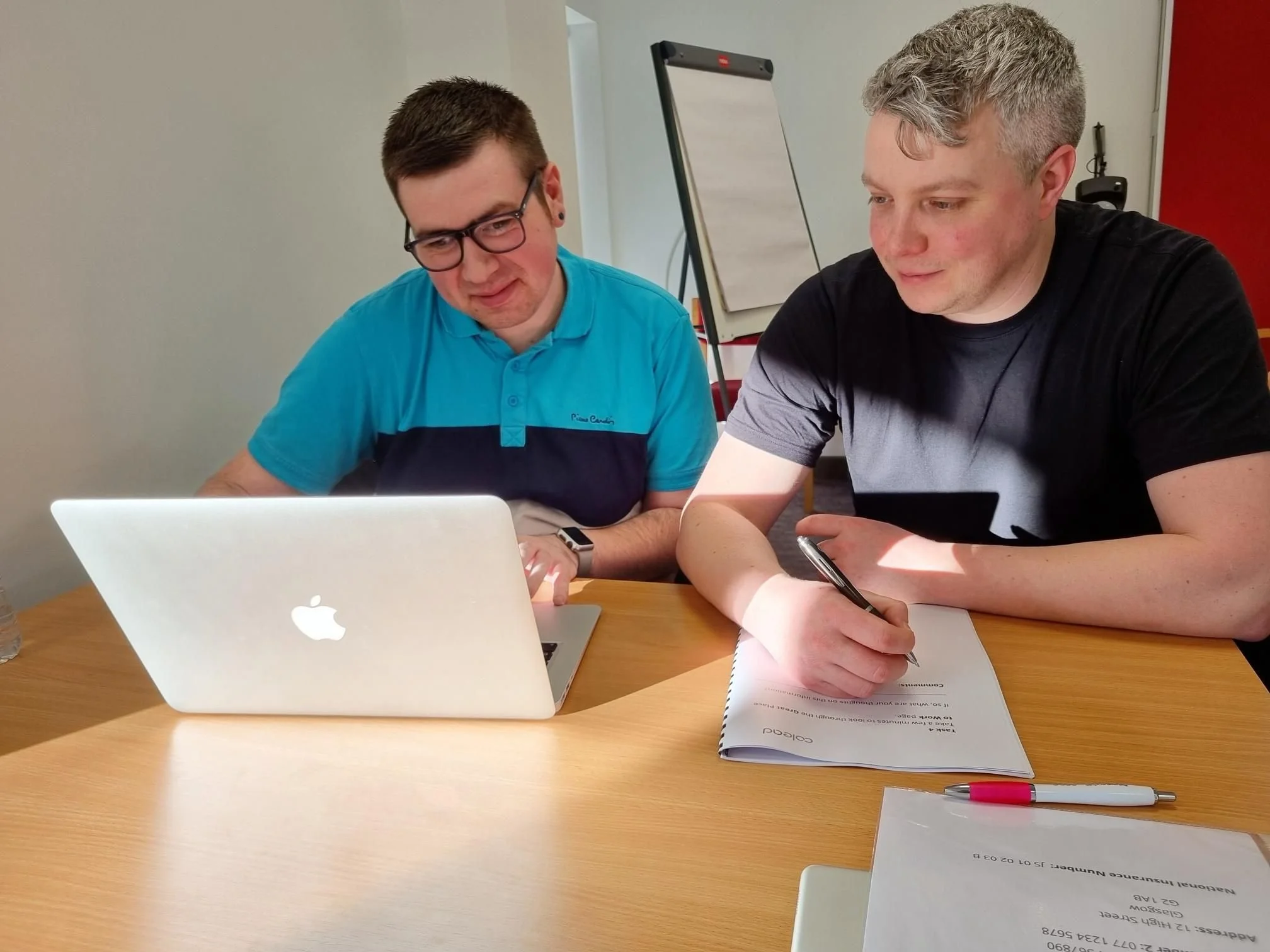Volunteer testing a website on a macbook