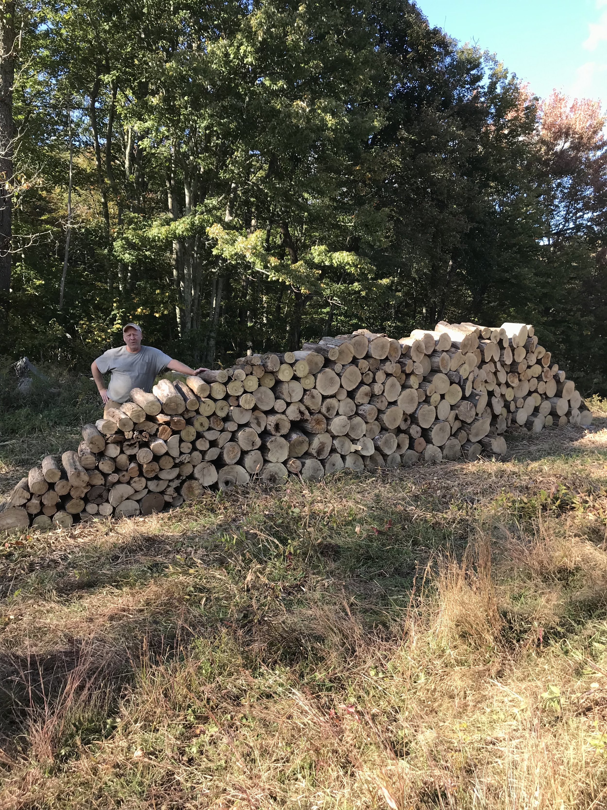 Oranssi technician working on a roof project