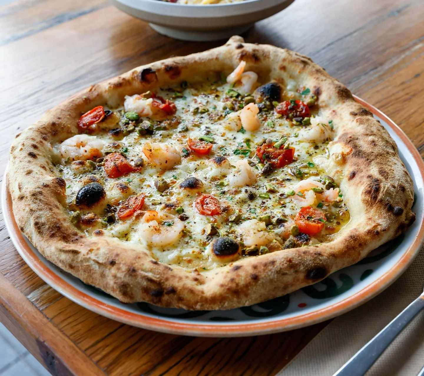 🔥 PIZZA SPECIAL 🔥

Roasted Pistachio Honey Prawns 🦐🍯
with fresh cherry tomatoes 🍅 on our wood-fired base.

Sweet. Nutty. Savory. Perfect. 🍕✨

Available this week only at La Piazzetta Sydney.

#PizzaSpecial #LaPiazzettaSydney #WoodFiredPizza #Sy