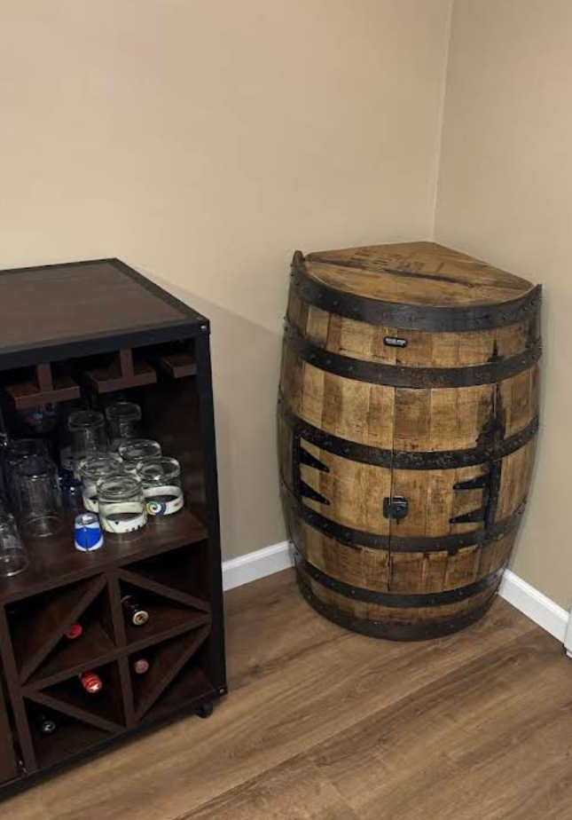 Corner whiskey barrel cabinet with doors