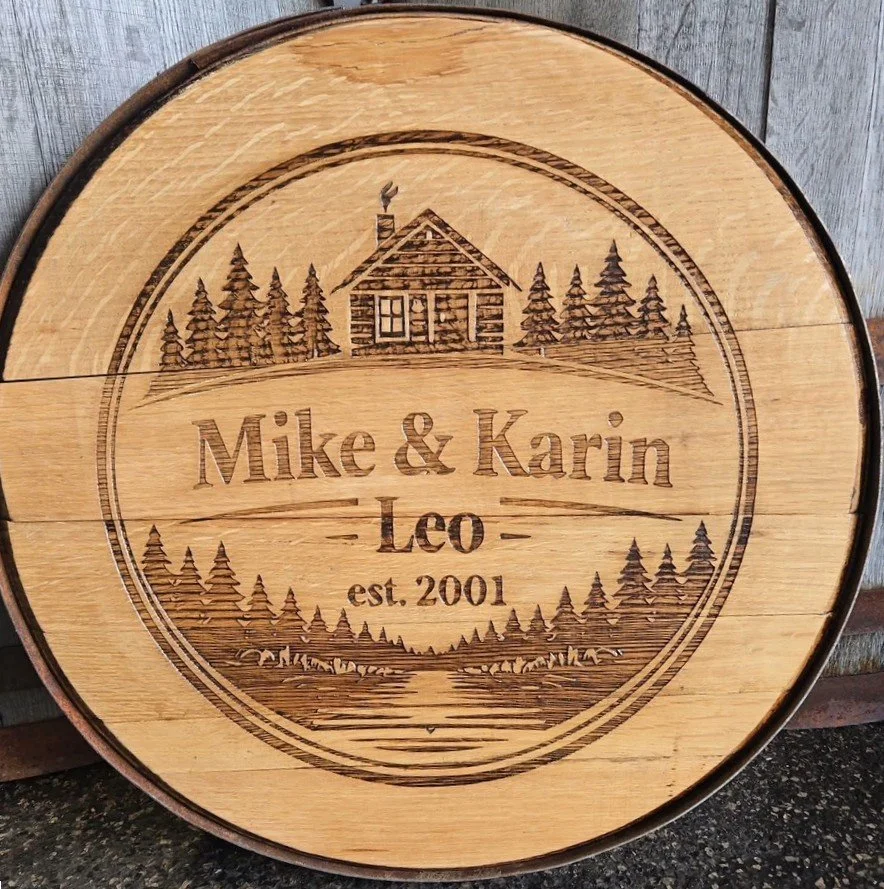 Whiskey Barrel lid engraved with Mike and Karin Leo est. 2001