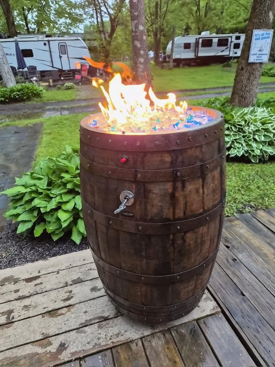 Whiskey barrel, propane firepit.