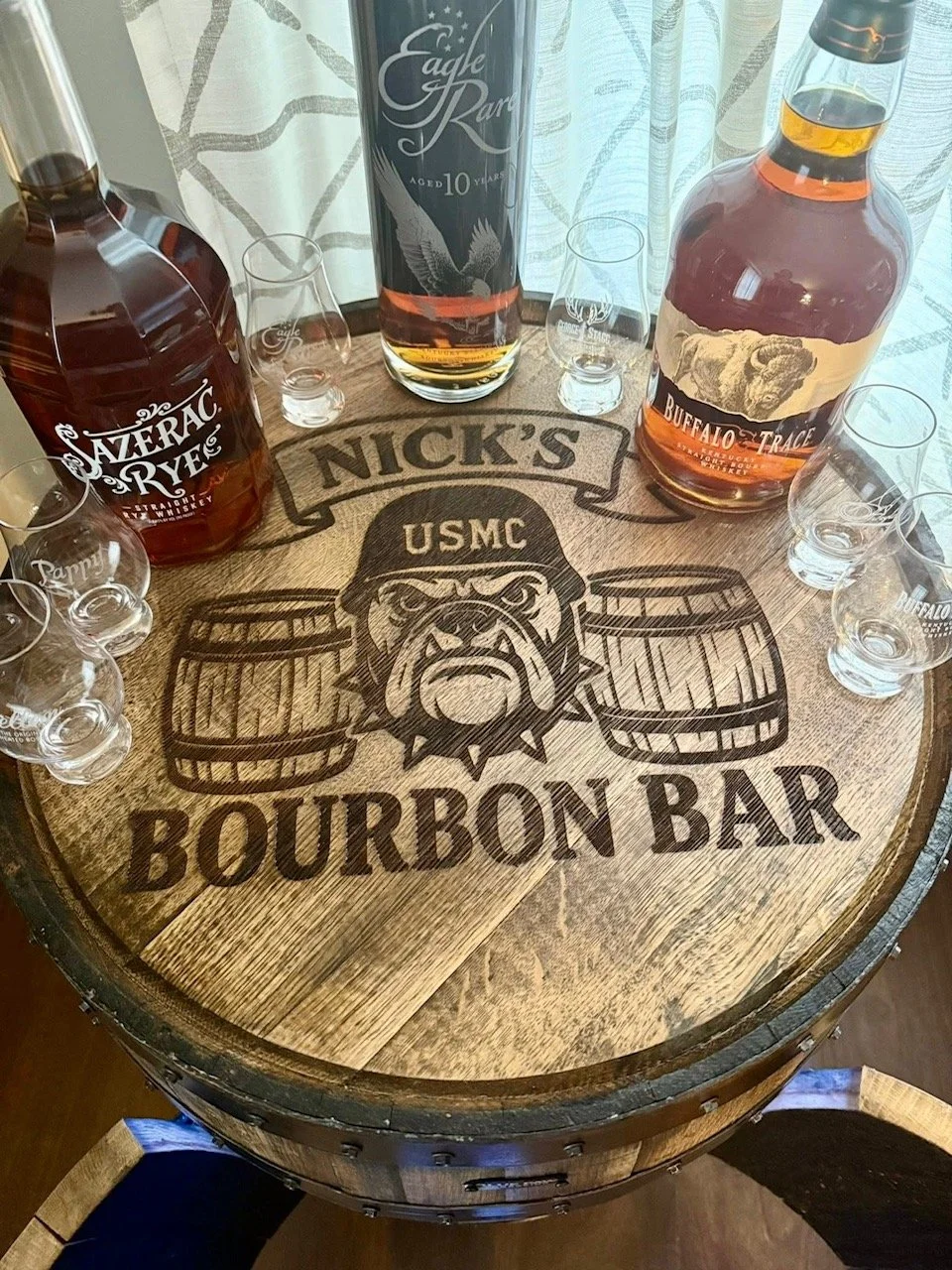 Laser engraved bourbon barrel cabinet with USMC bulldog logo