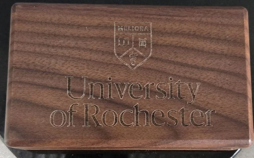Walnut keepsake box engraved with University of Rochester name and logo