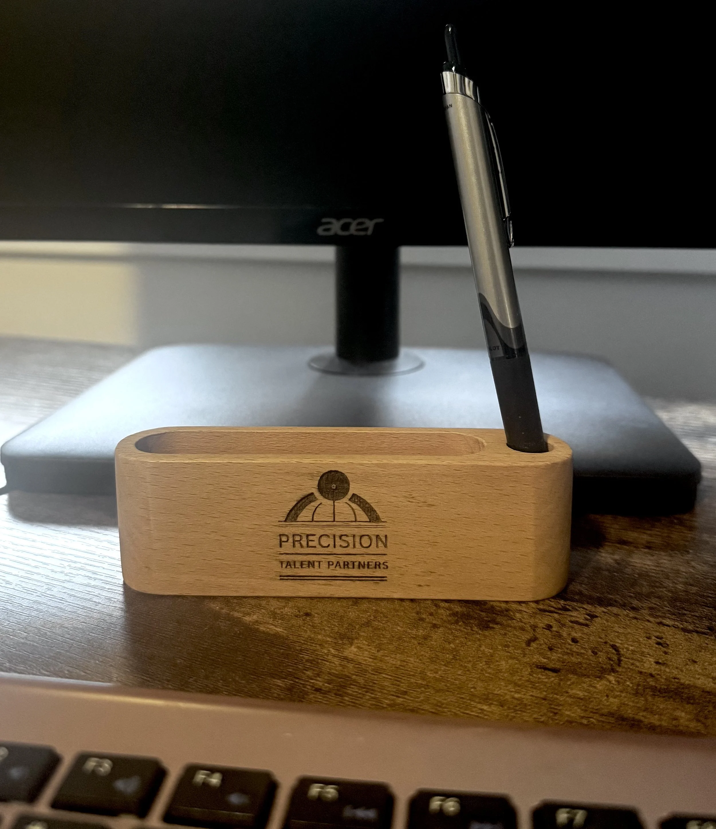 Engraved business card holder on work desk