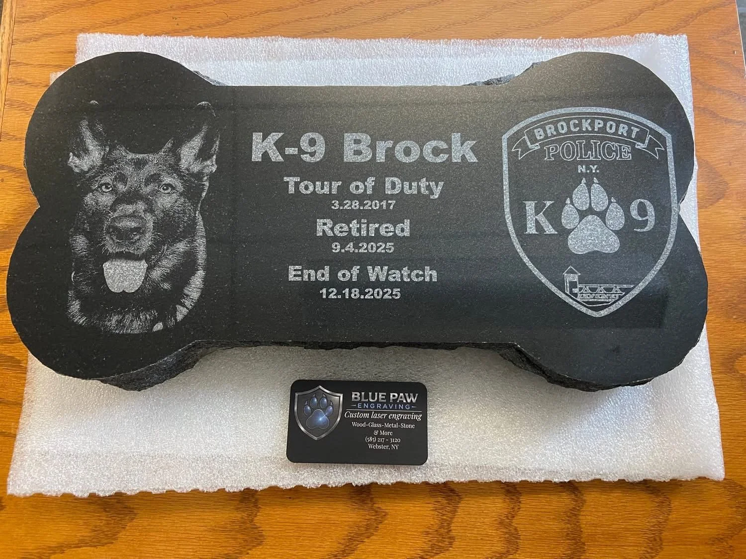 Engraved dog portrait granite grave marker