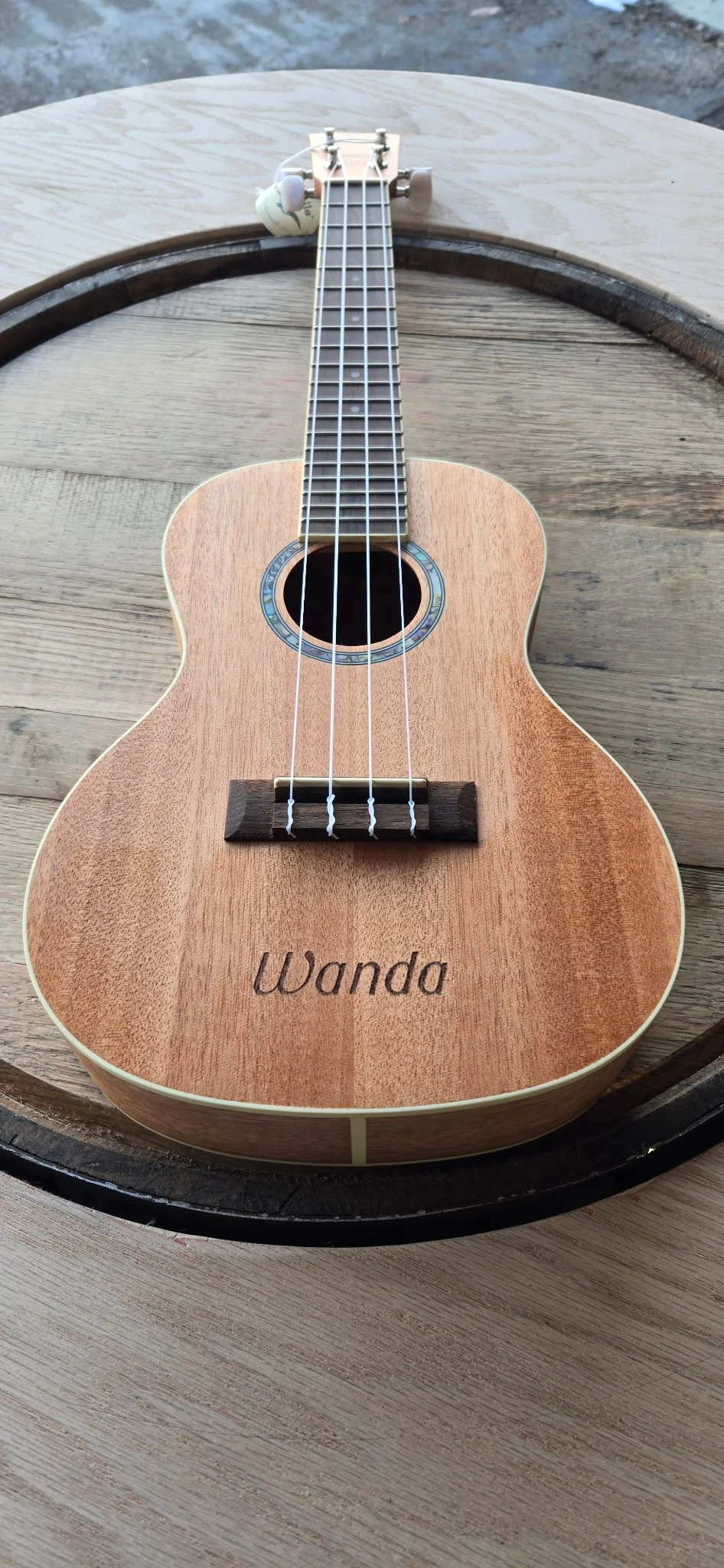Guitar engraved with the owner's name, Wanda