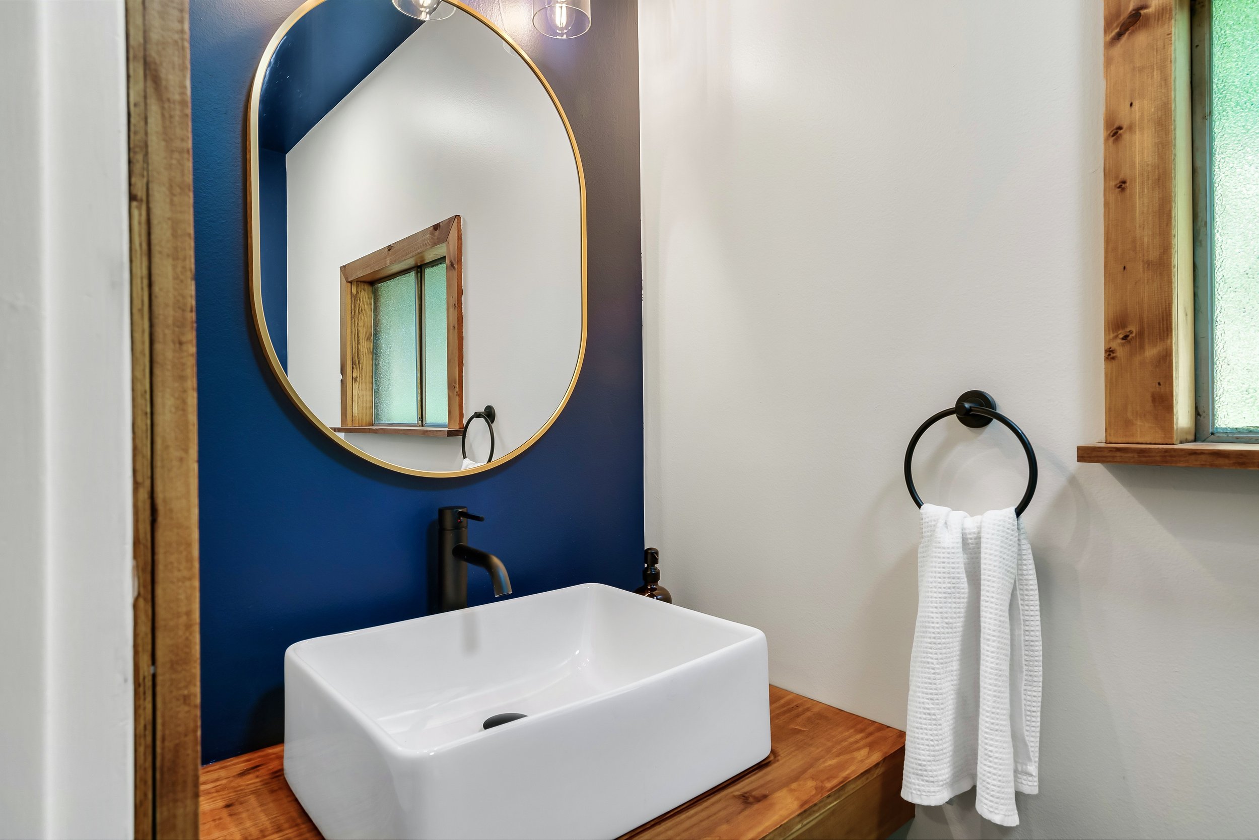 The downstairs half bath