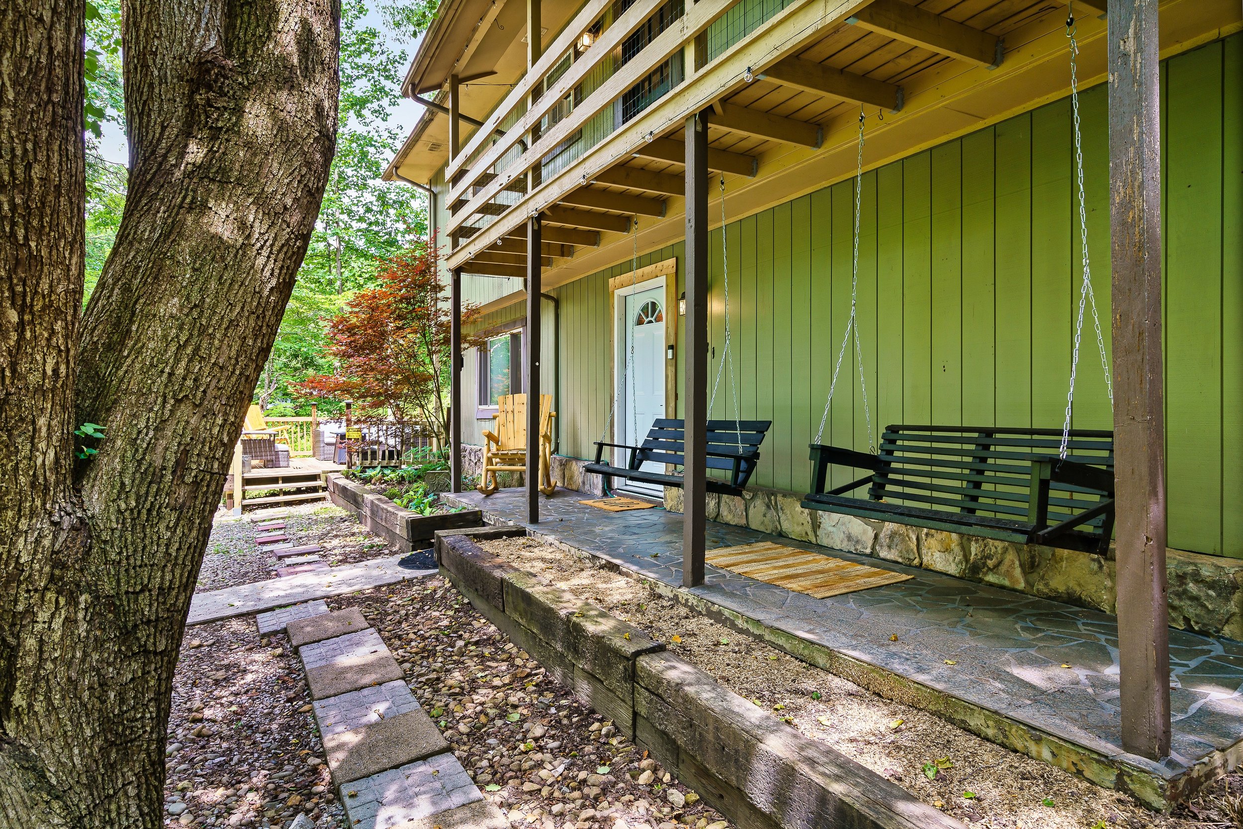 Enjoy the porch swings while you listen to the beautiful sounds of nature