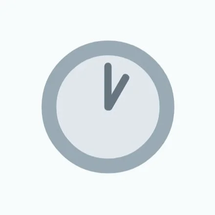 A simple clock icon showing the time as 12:00.