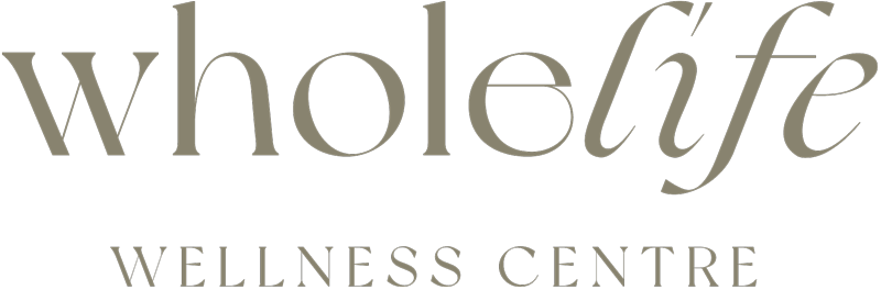 Logo of Wholelife Wellness Centre with stylized text in black background.
