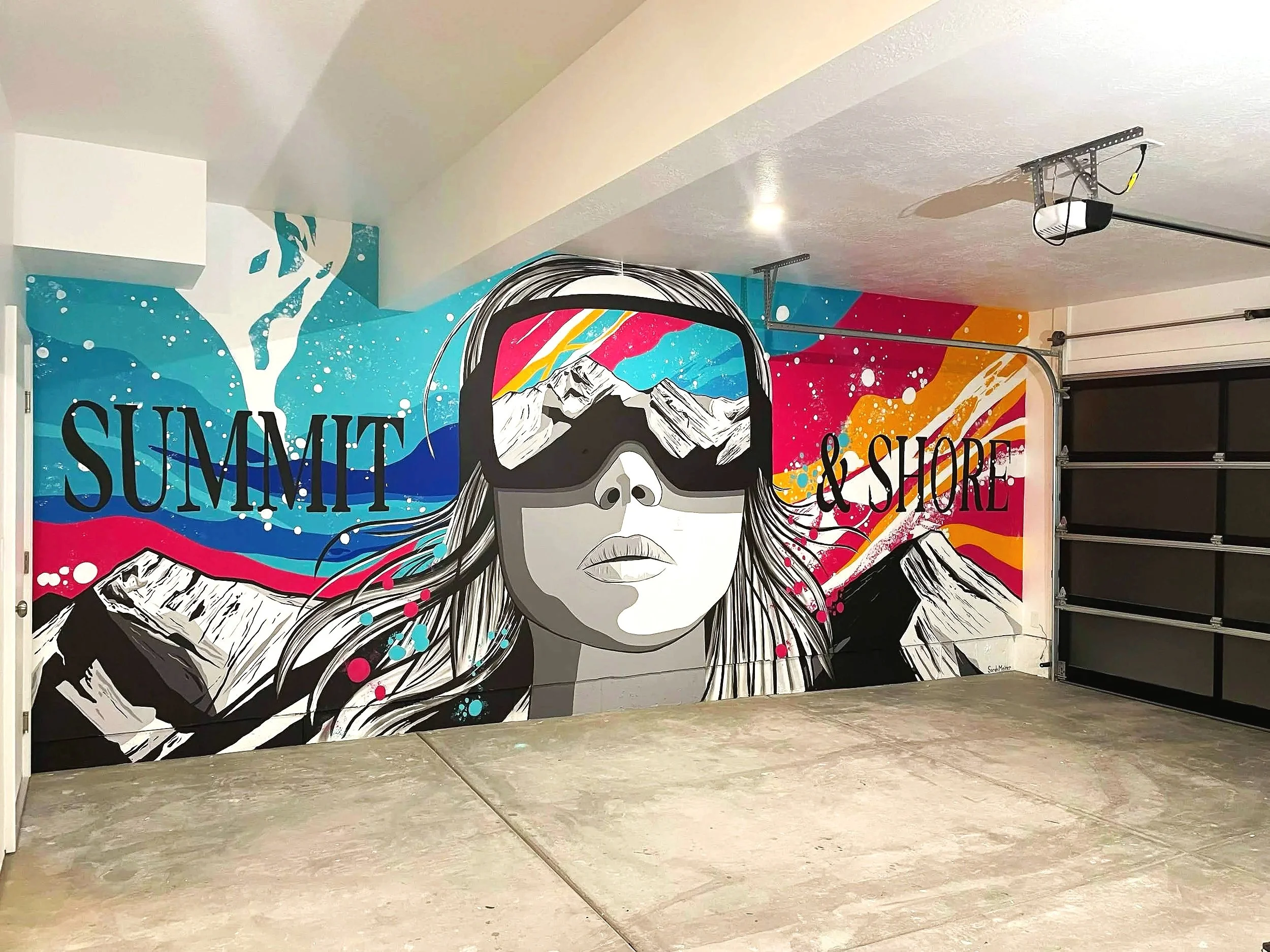 Stylized snowboarder mural with reflective mountain goggles in a Park City Utah Airbnb vacation rental