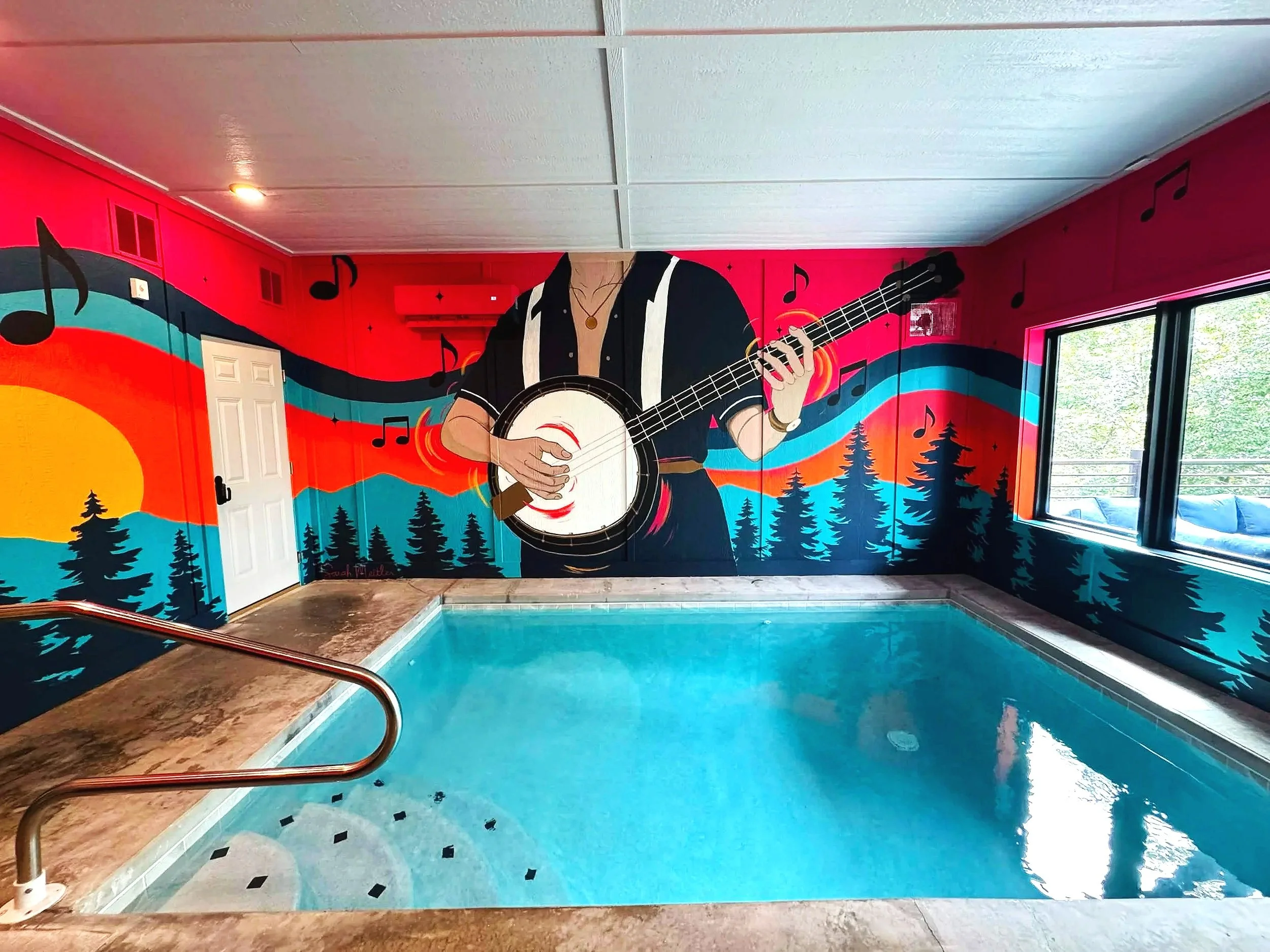 Custom banjo pool room mural in a Sevierville, Tennessee Airbnb cabin