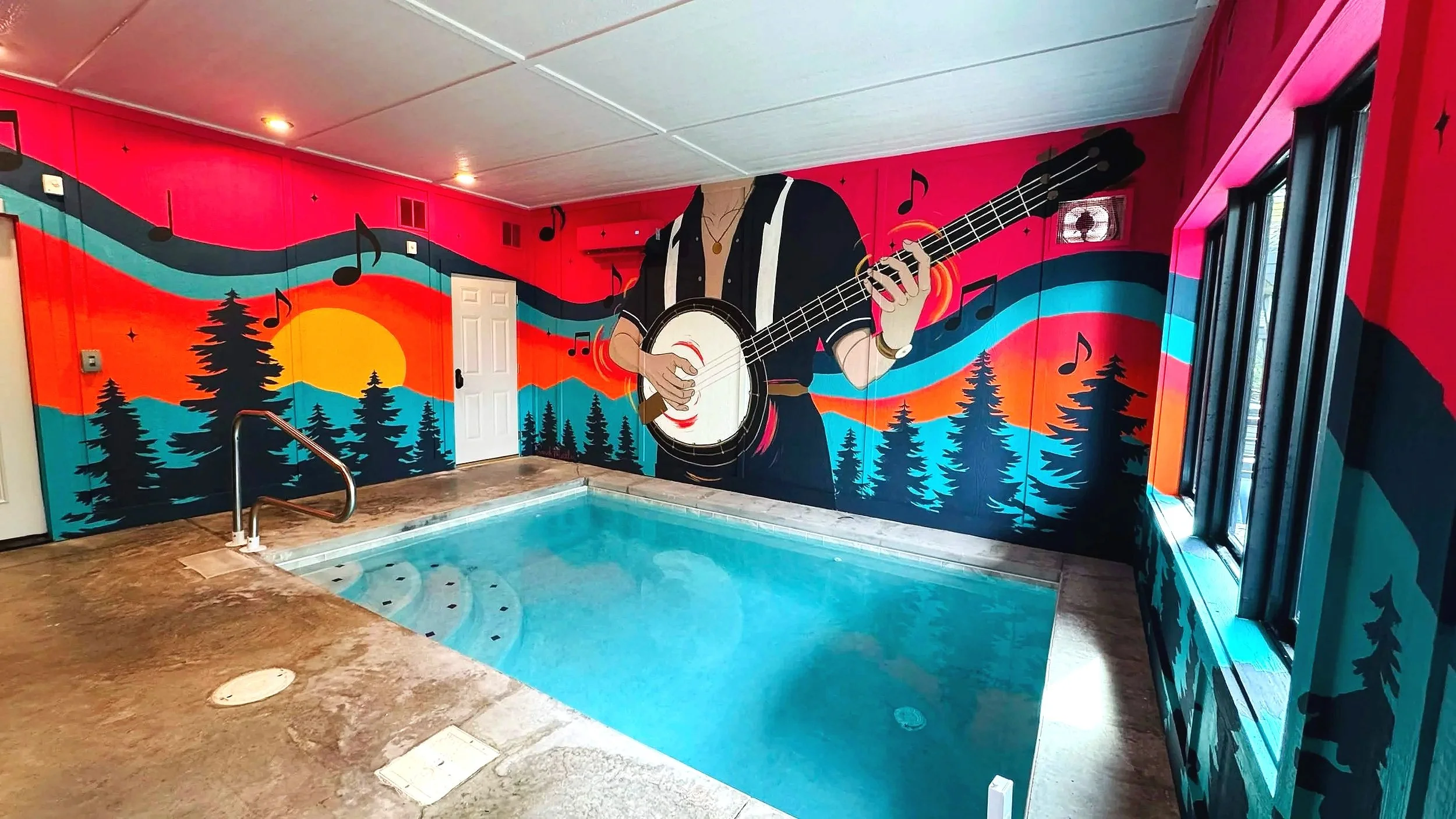 Custom banjo pool room mural in a Sevierville, Tennessee Airbnb cabin
