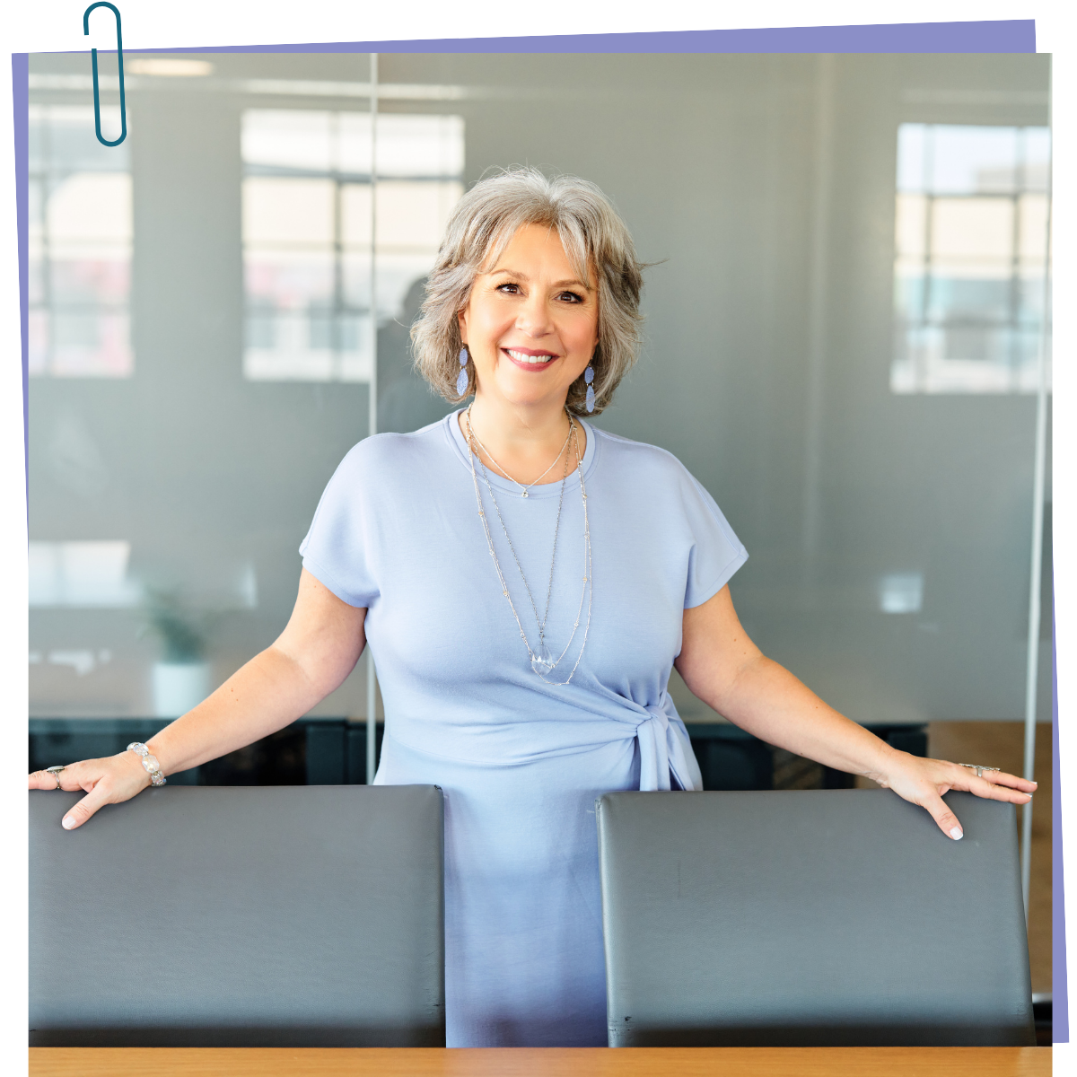 Theresa Rose at the boardroom table