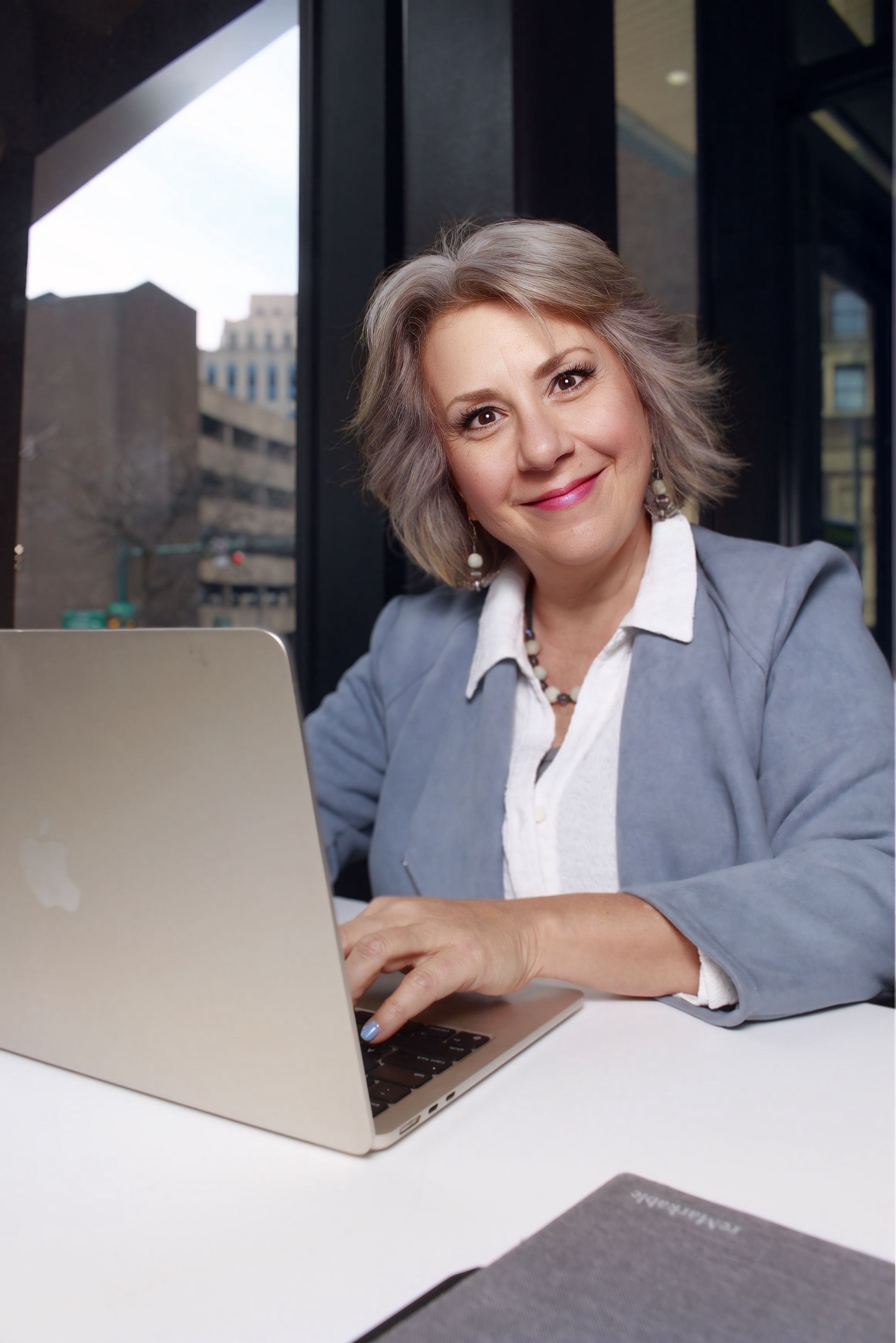 Theresa Rose typing on computer