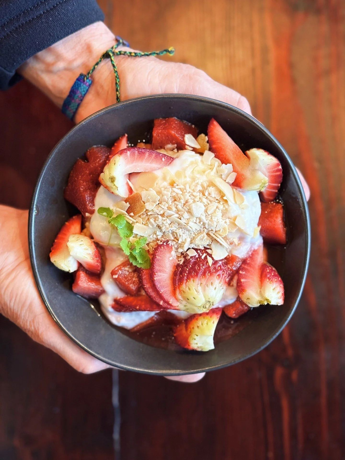 A little bowl of winter happiness. ❤️🤍⁠
⁠
Our Quince Charming Porridge is warm, comforting and just the right amount of sweet&mdash;vanilla and cinnamon porridge, poached quince, fresh berries, creamy coconut, and toasted almonds.⁠
⁠
The perfect way
