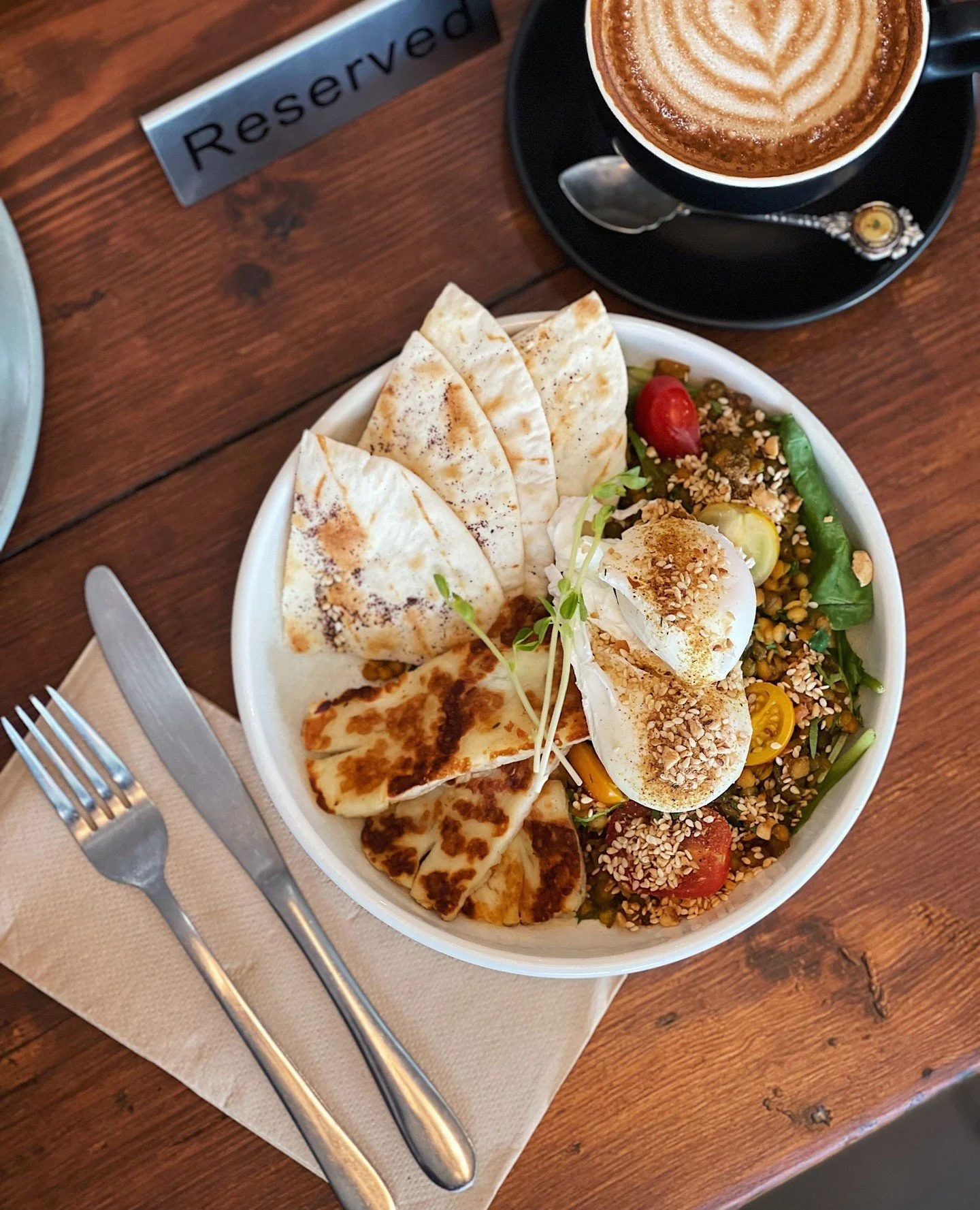 Not every brunch has to be smashed avo. ⁠
⁠
Our Turkish Breakfast Bowl is packed with two poached eggs, grilled halloumi, spiced lentils, baby spinach, cherry tomatoes, hazelnut dukkah and warm za'atar bread. 🙌⁠
⁠
You'll find it exclusively at our S