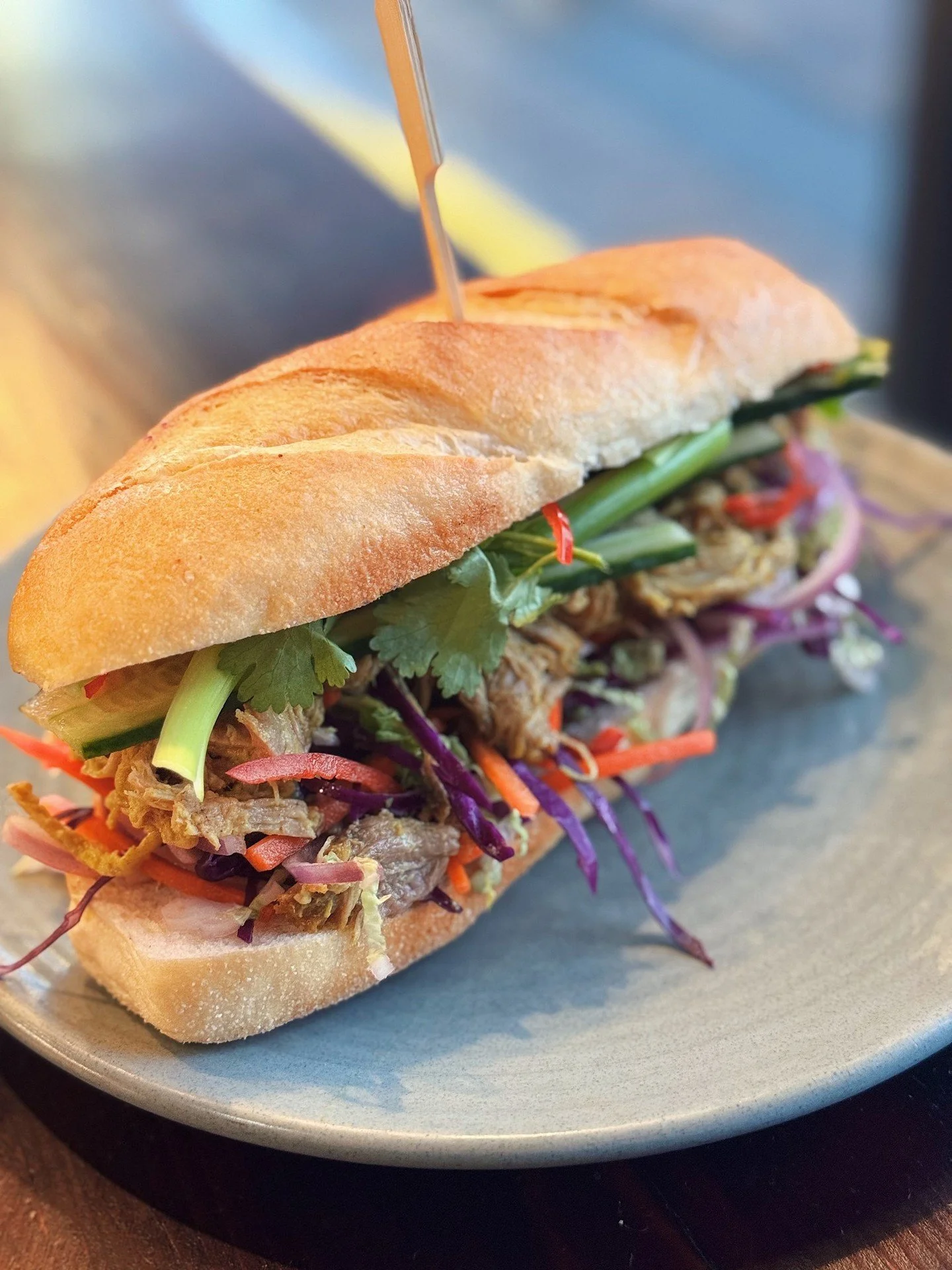 Our Pulled Pork B&aacute;nh M&igrave;. 🐷⁠
Slow-cooked lemongrass &amp; ginger pork, crunchy Asian slaw, coriander and creamy chilli jam, all packed into a proper crunchy roll.⁠
⁠
Messy? Probably.⁠
Worth it? Absolutely.⁠
⁠
-⁠
📍1/107 Macquarie Rd, Sp