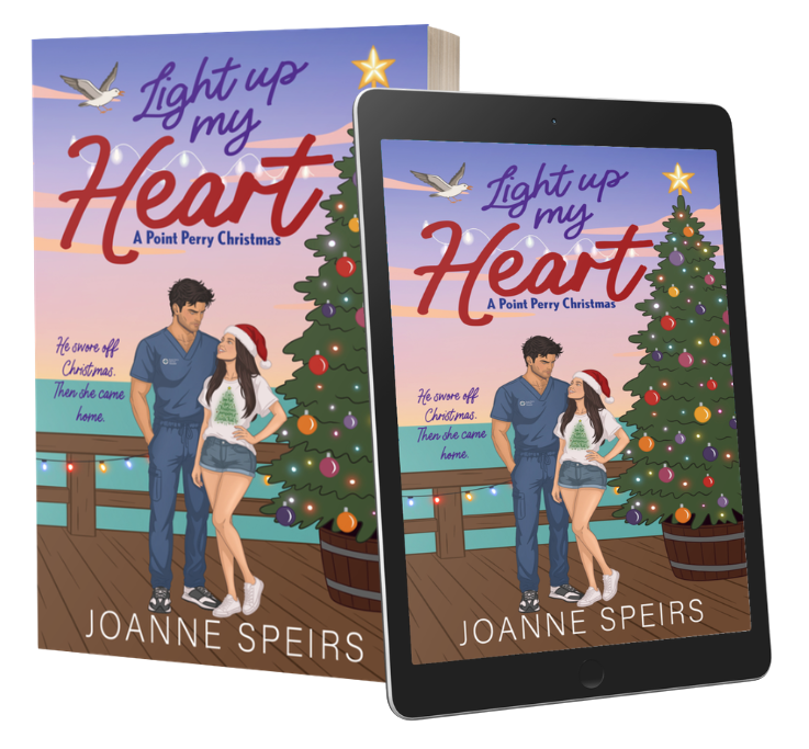Light Up My Heart: A Point Perry Christmas by Joanne Speirs—a 2025 RWA Romantic Book of the Year finalist, shown as paperback and ebook editions featuring a couple beside a Christmas tree in a coastal Australian small-town setting.