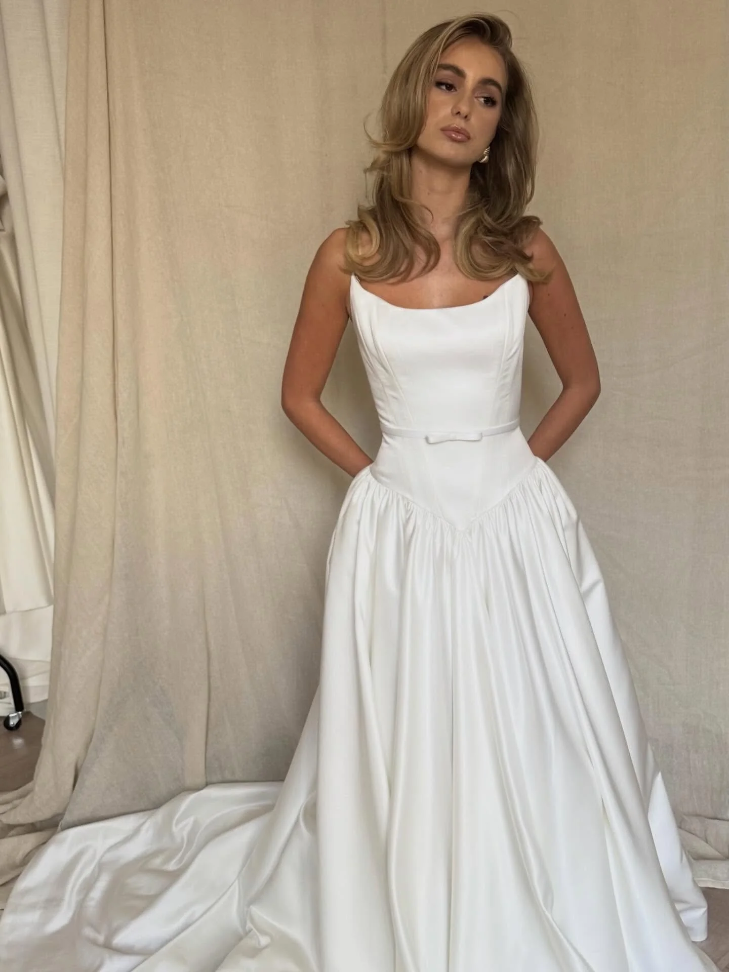 Frames from today&rsquo;s shoot 🎥📸

No.1 Model @millieeasterr looking elegant in the stunning JADE wedding dress by @elbethgillis 
Crafted from a divine duchess satin, you&rsquo;ll adore everything from her striking basque waist to that glorious fl