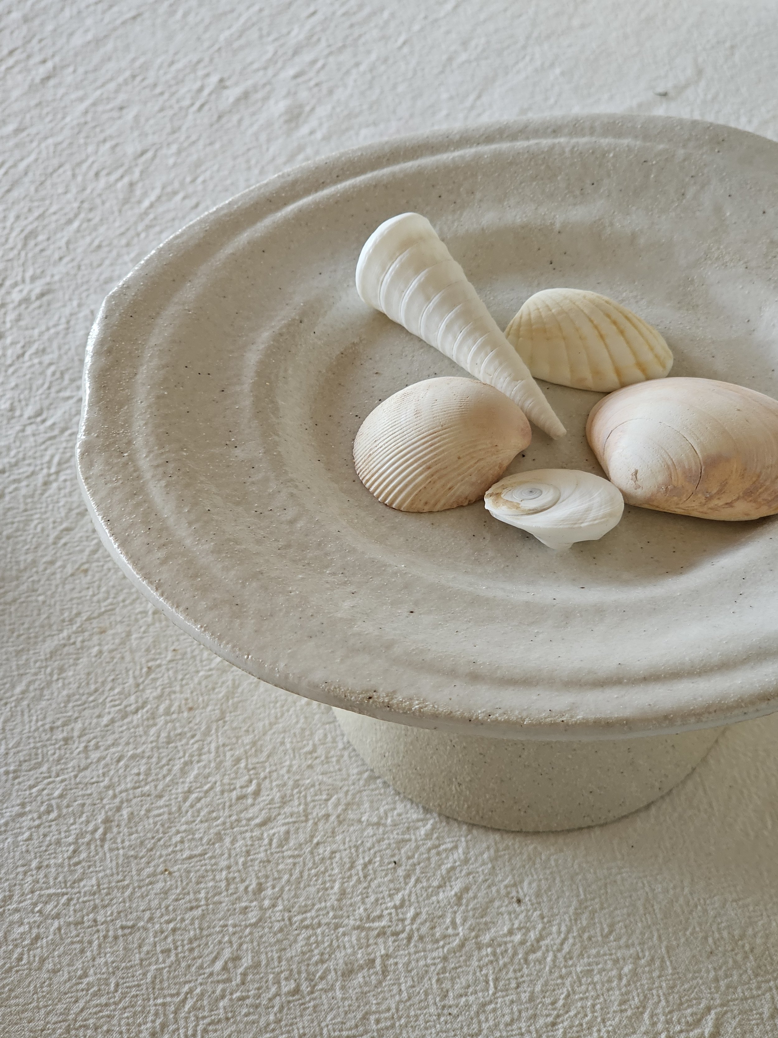 Footed plate