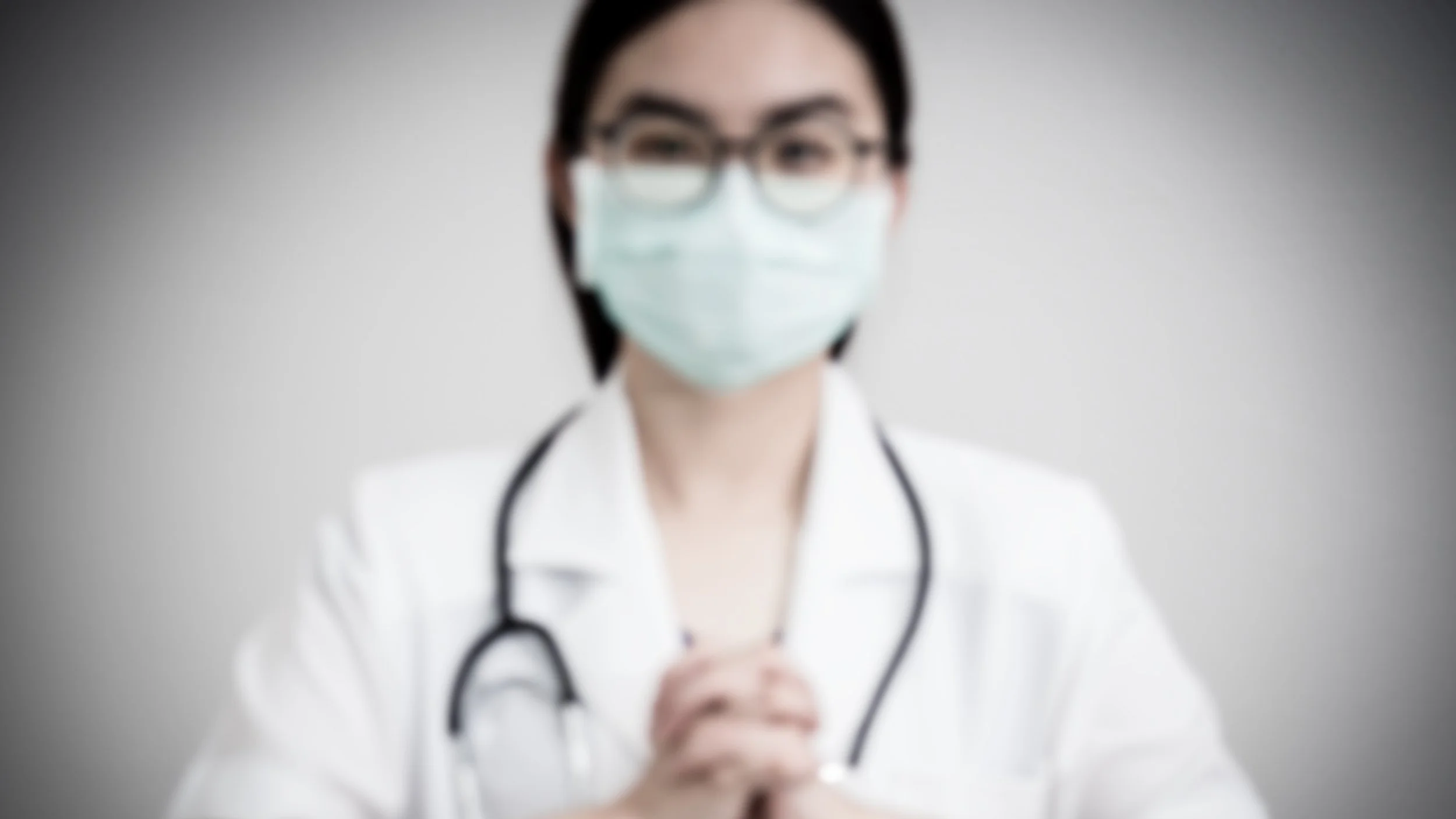 blurry photo of doctor