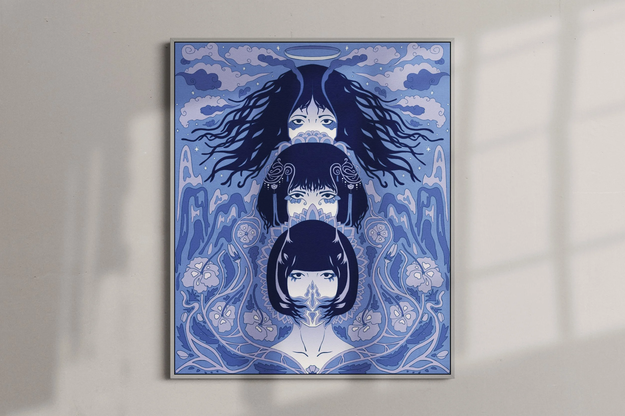 A digital illustration featuring three women with long dark hair, surrounded by clouds and floral motifs, rendered in shades of blue, with a halo above the top figure's head.