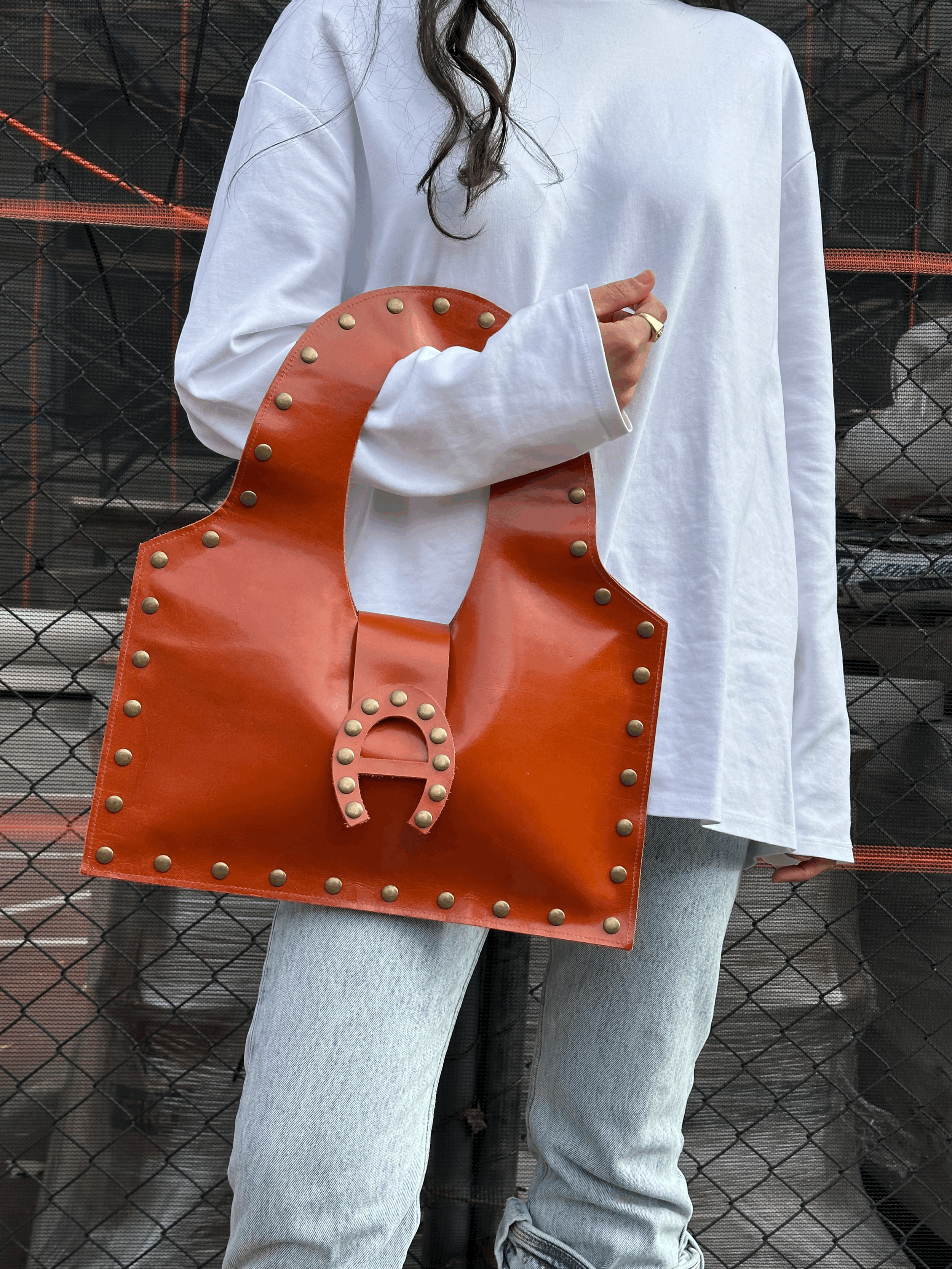 COGNAC BROWN LOGO BUCKLE STUDDED A01 BAG