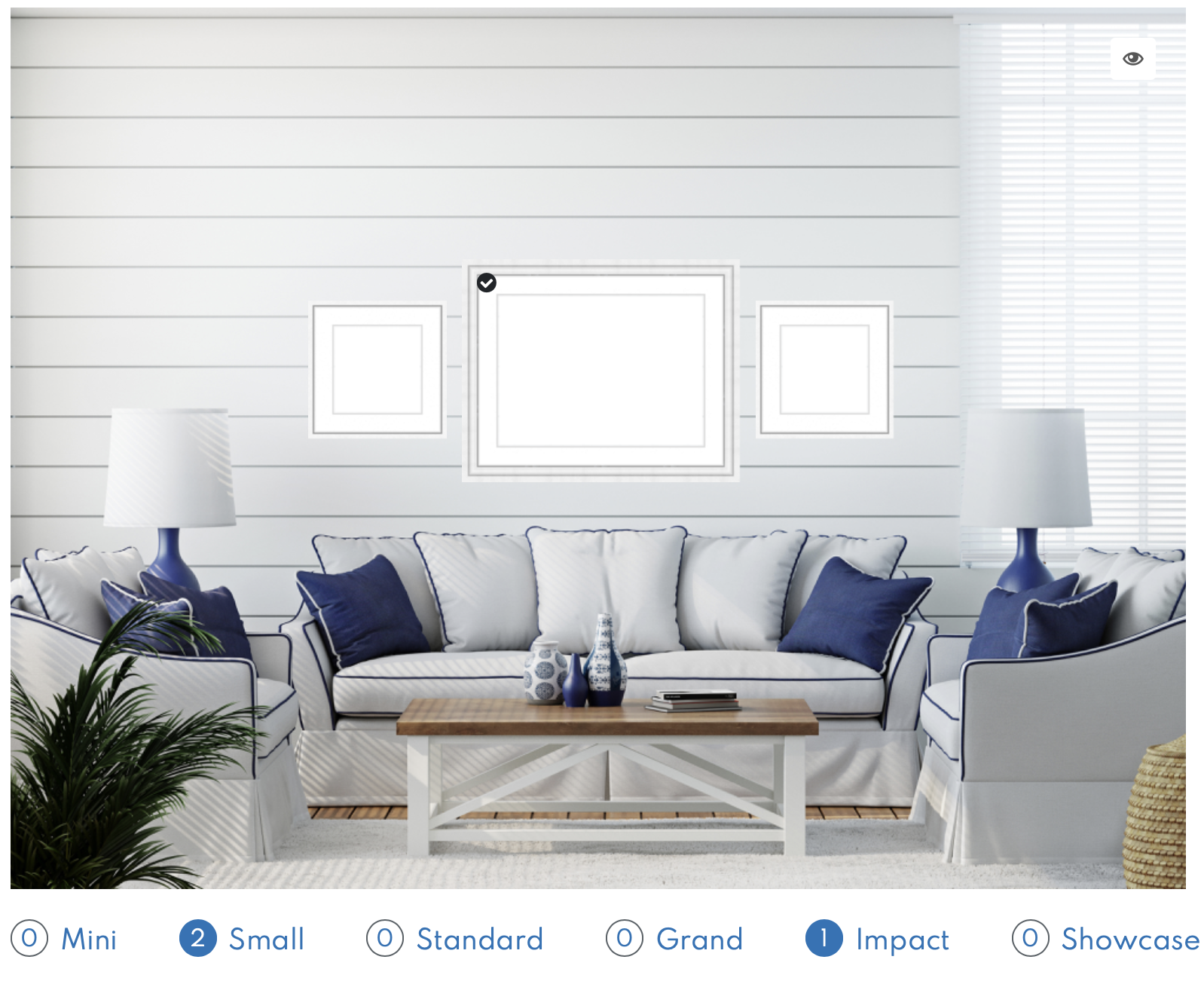 Three piece wall art display to scale over a white couch in a coastal inspired living room.