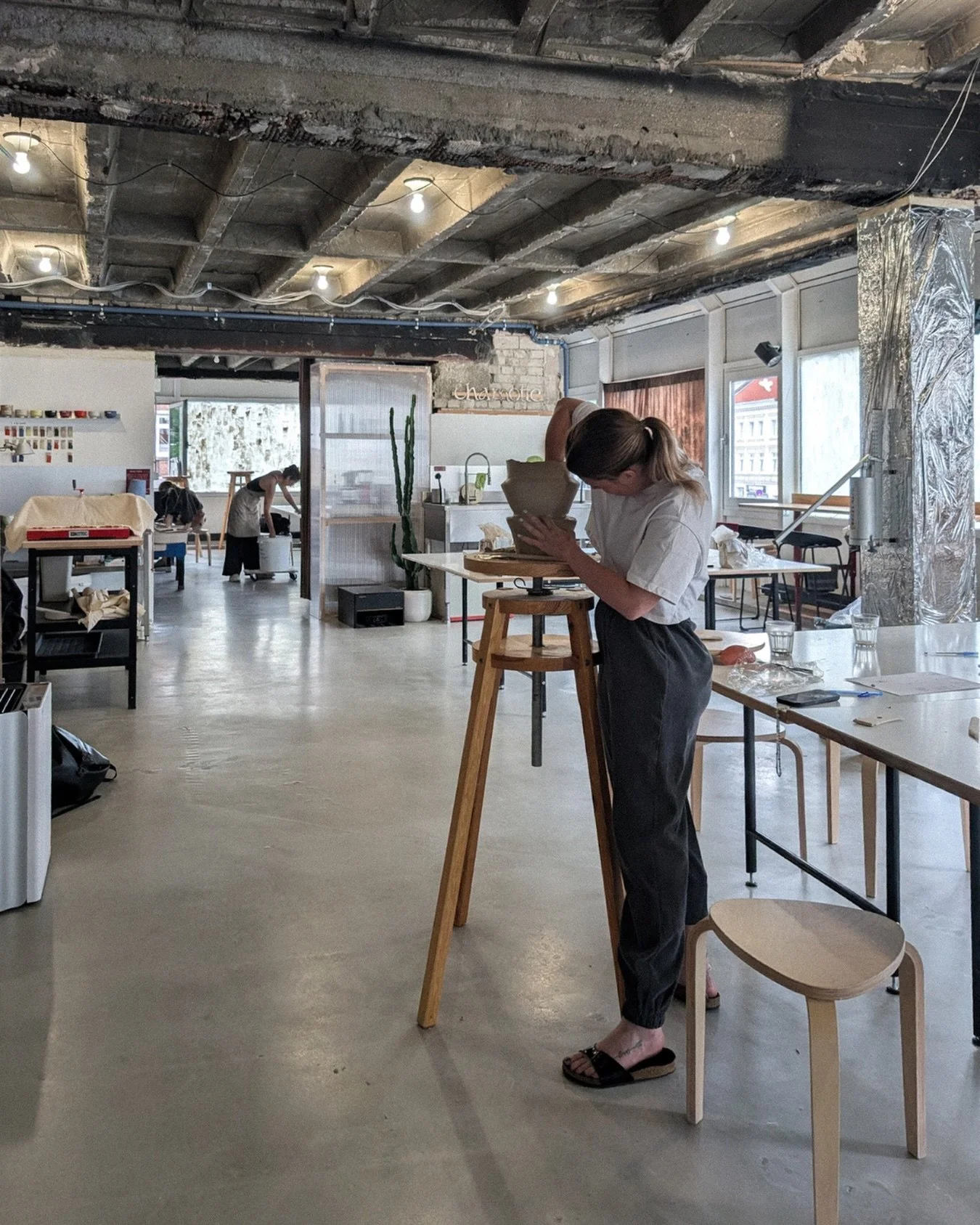 A quiet moment of focus, a table, a block of clay, and a form slowly coming to life.

This is what everyday studio time looks like at Chamotte &ndash; unhurried, hands-on, and deeply satisfying.
Space to experiment, to fail, to try again, and to grow