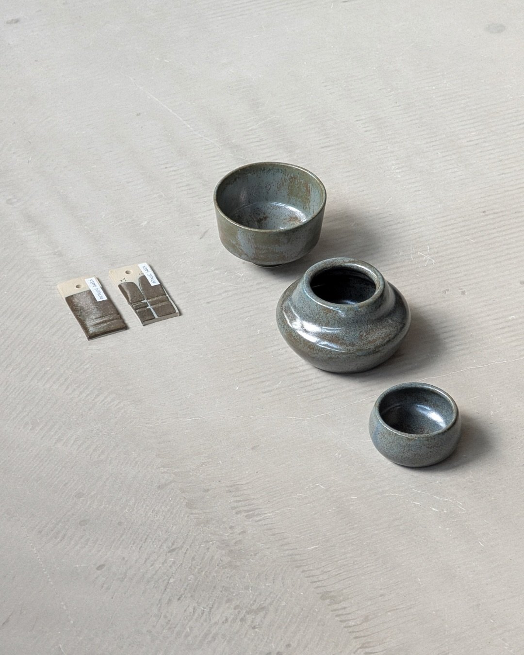 Our newest Studio Glaze: Metallic Blue, to be seen on sample tiles and some of Members&rsquo; works.

It quickly caught our community members&rsquo; hearts and they asked us to prepare more than just a sample bucket.

All Studio Glazes are available 