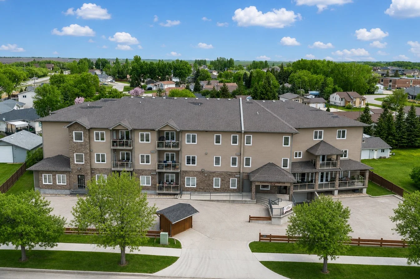 001 Exterior view of Chateau Lorette condos at 1223 Dawson Road in Lorette Manitoba.jpg