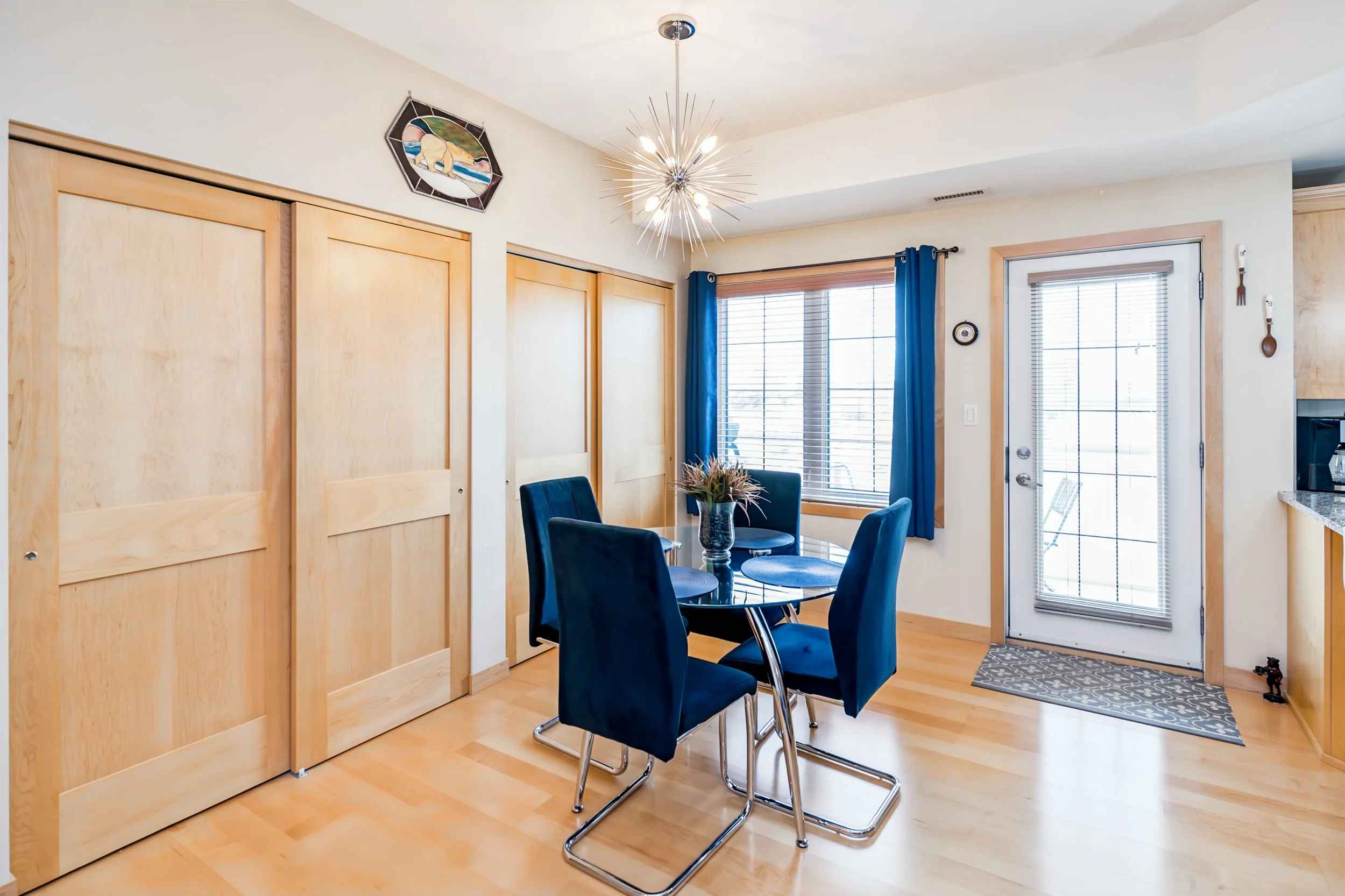 003 Bright open-concept living room in Chateau Lorette condo.jpg