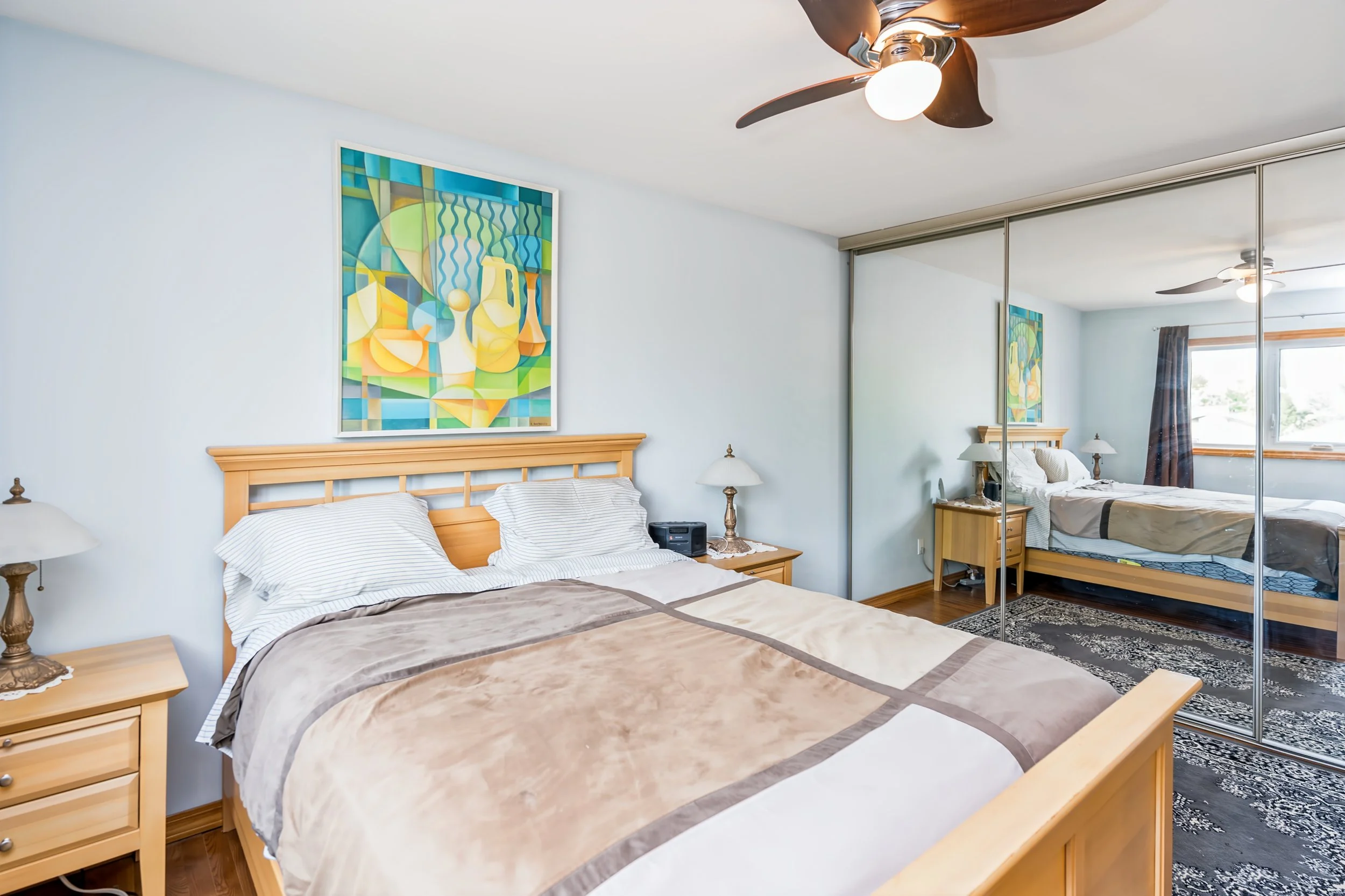 026 Spacious primary bedroom with wall-to-wall closet in Winnipeg MAnitoba.jpg