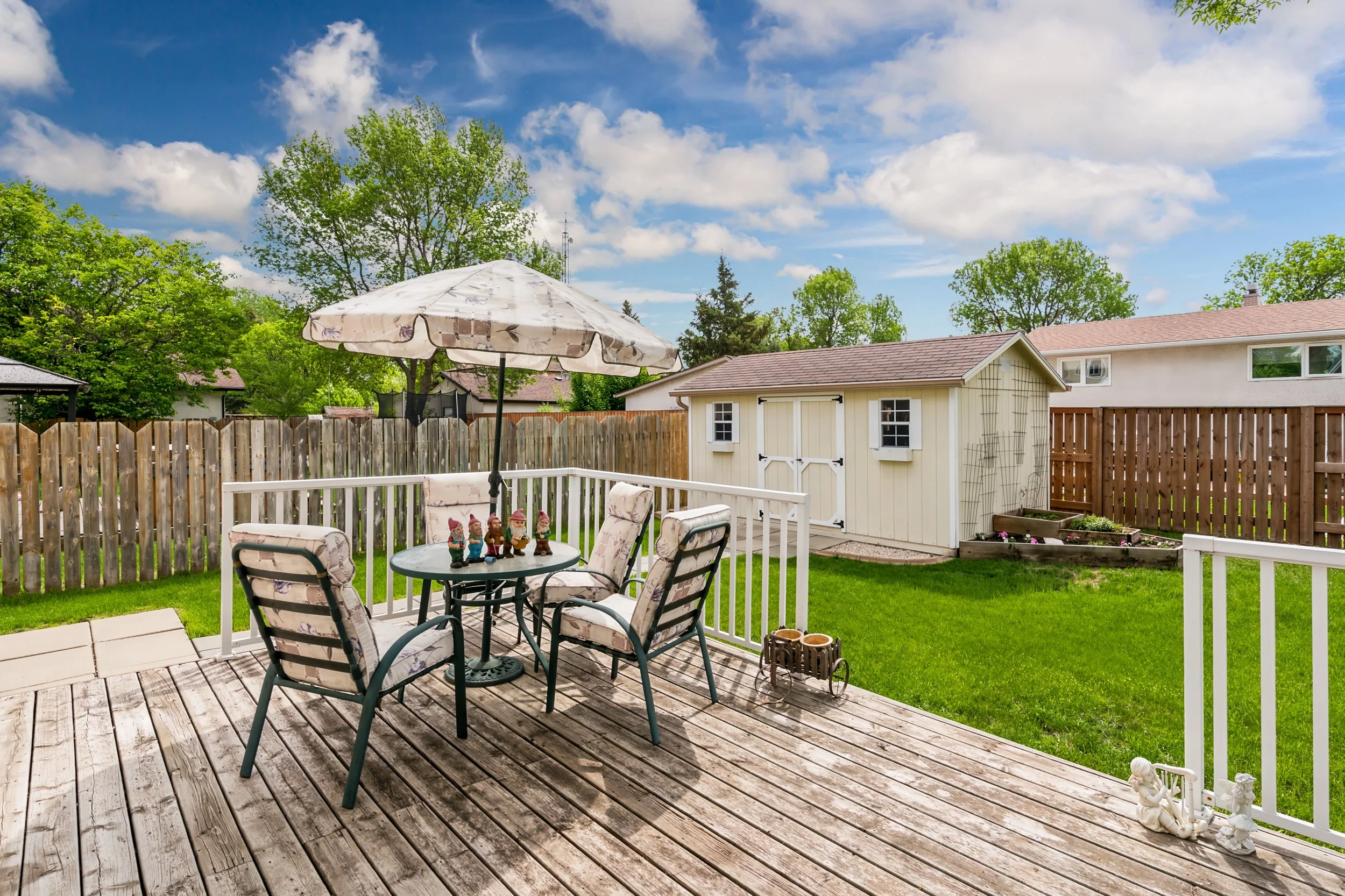 042 Backyard in Oakwood Estates Winnipeg with 16 by 10 foot storage shed.jpg