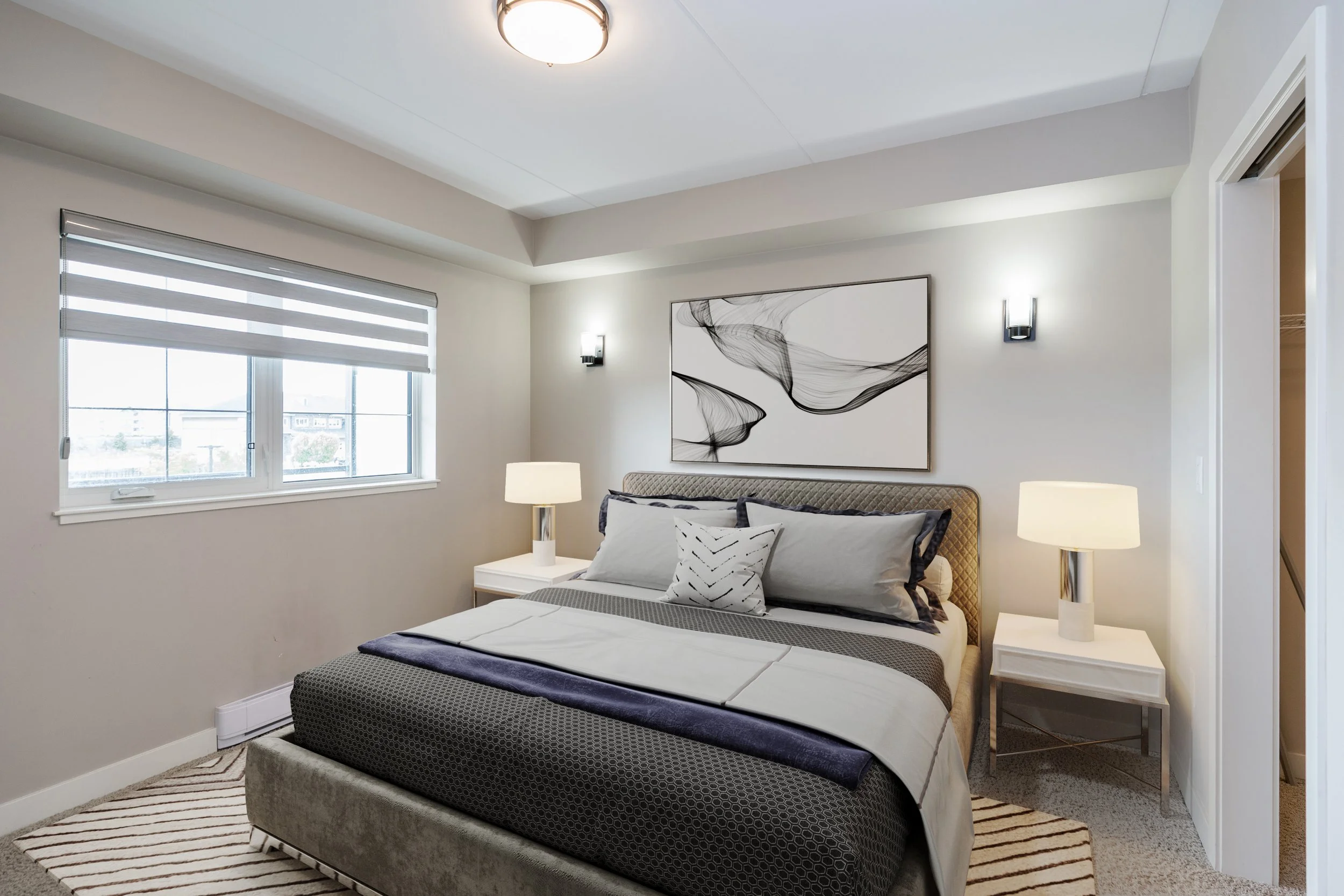 015 Primary bedroom with walk-through closet access to 4-piece bathroom.jpg