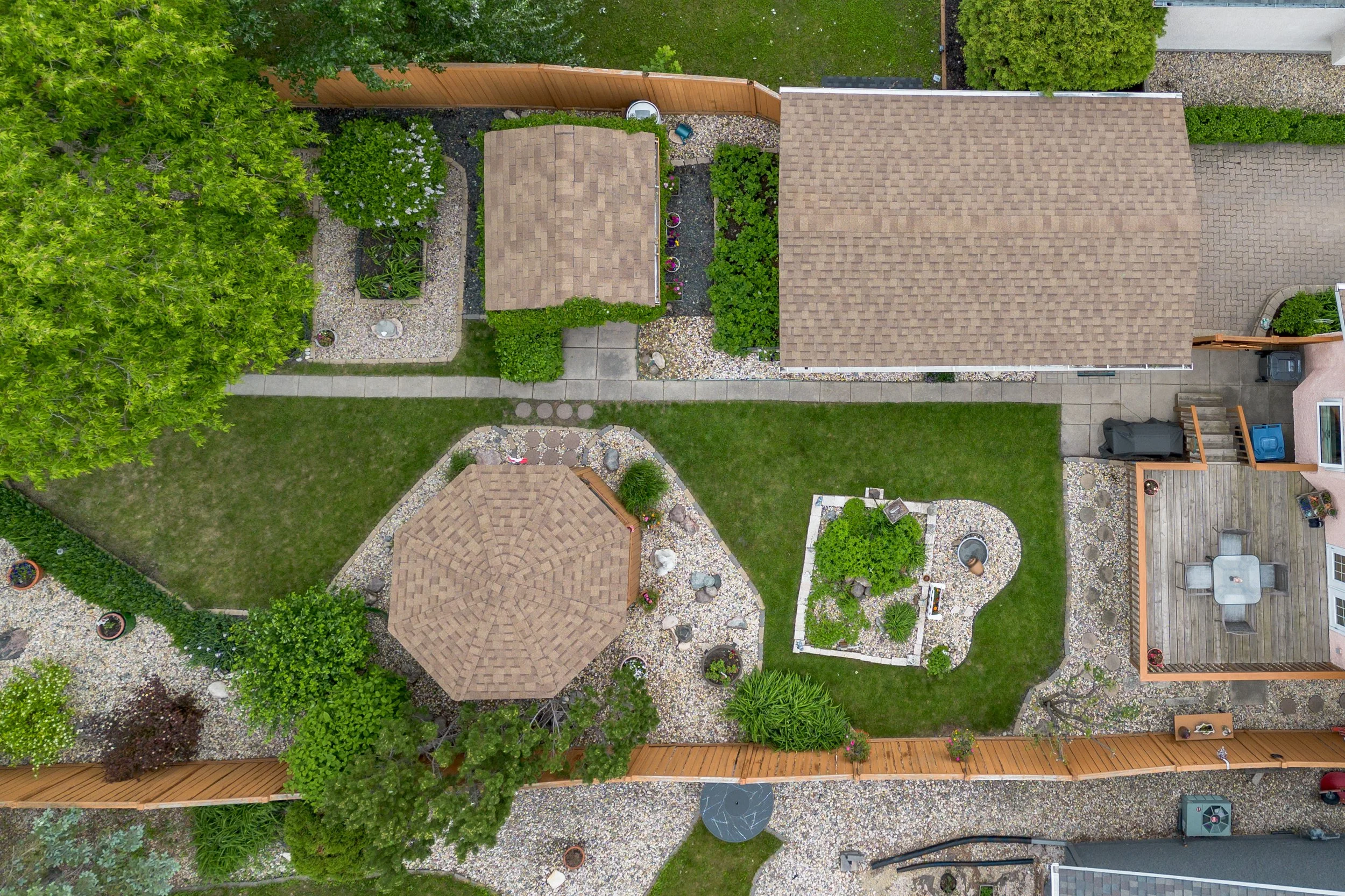 045 New shingles on roof, gazebo, garage and shed.jpg
