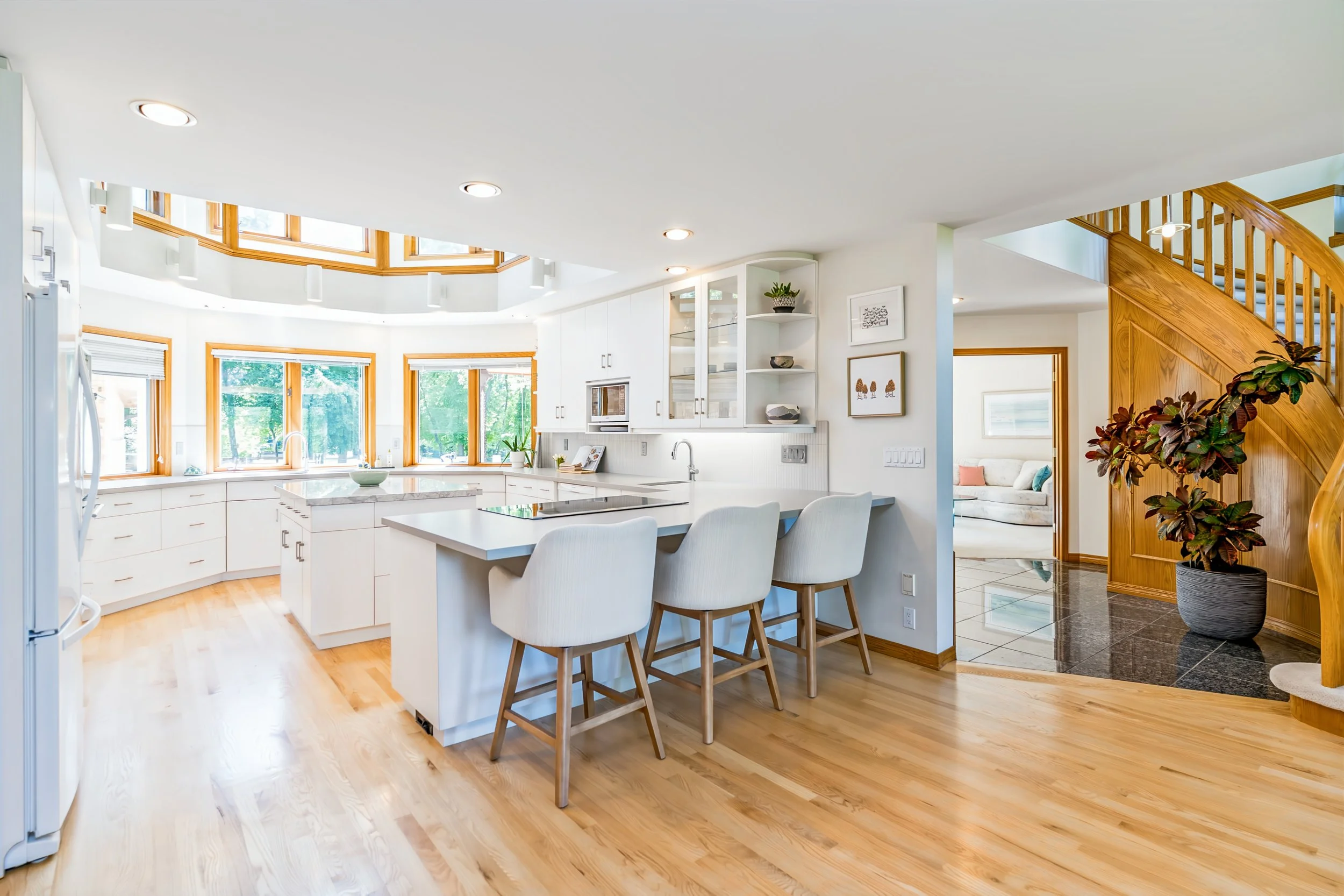 003 Custom kitchen at the heart of River Road home.jpg