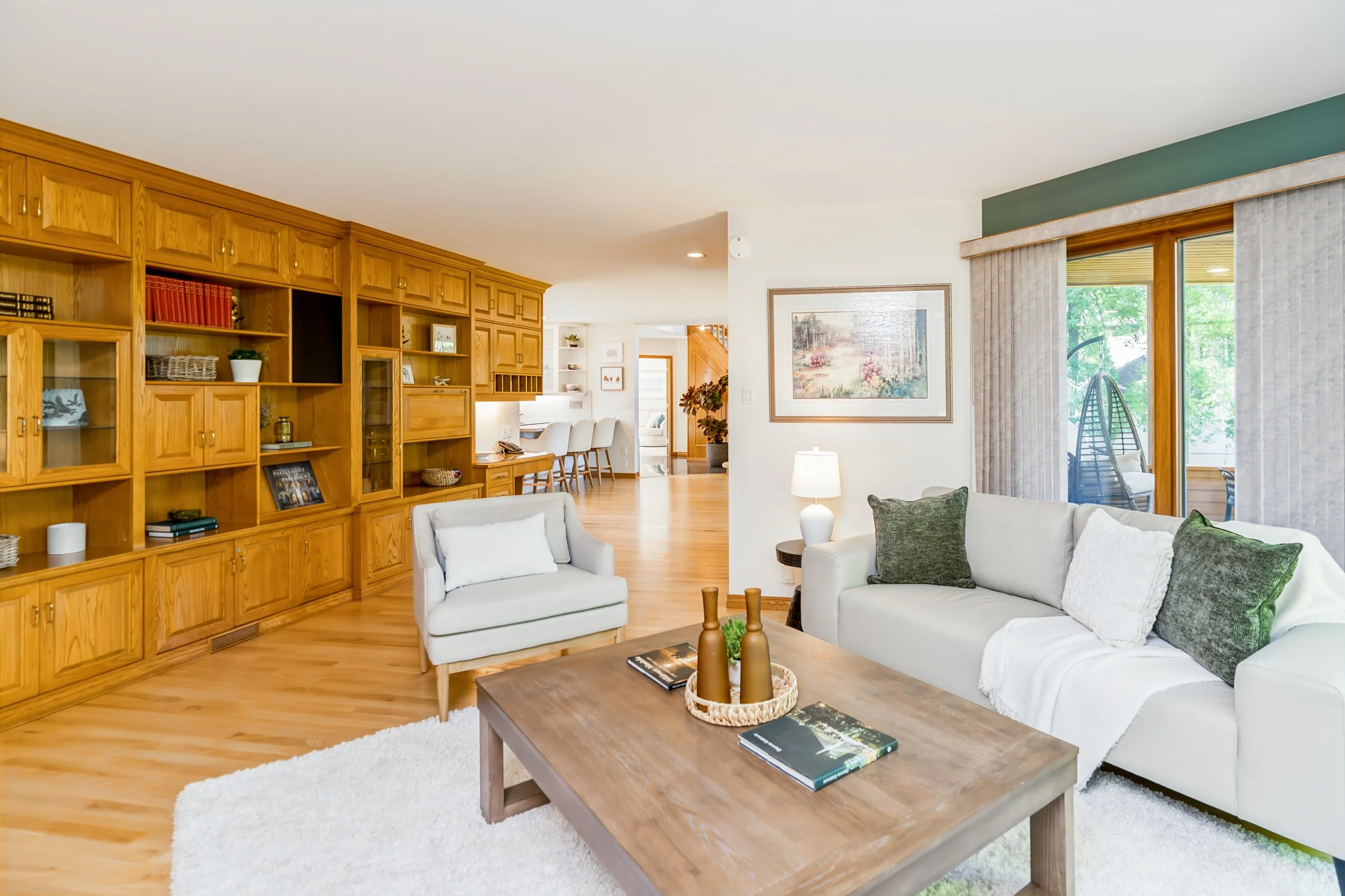 005 Family room with wood-burning fireplace and river views.jpg