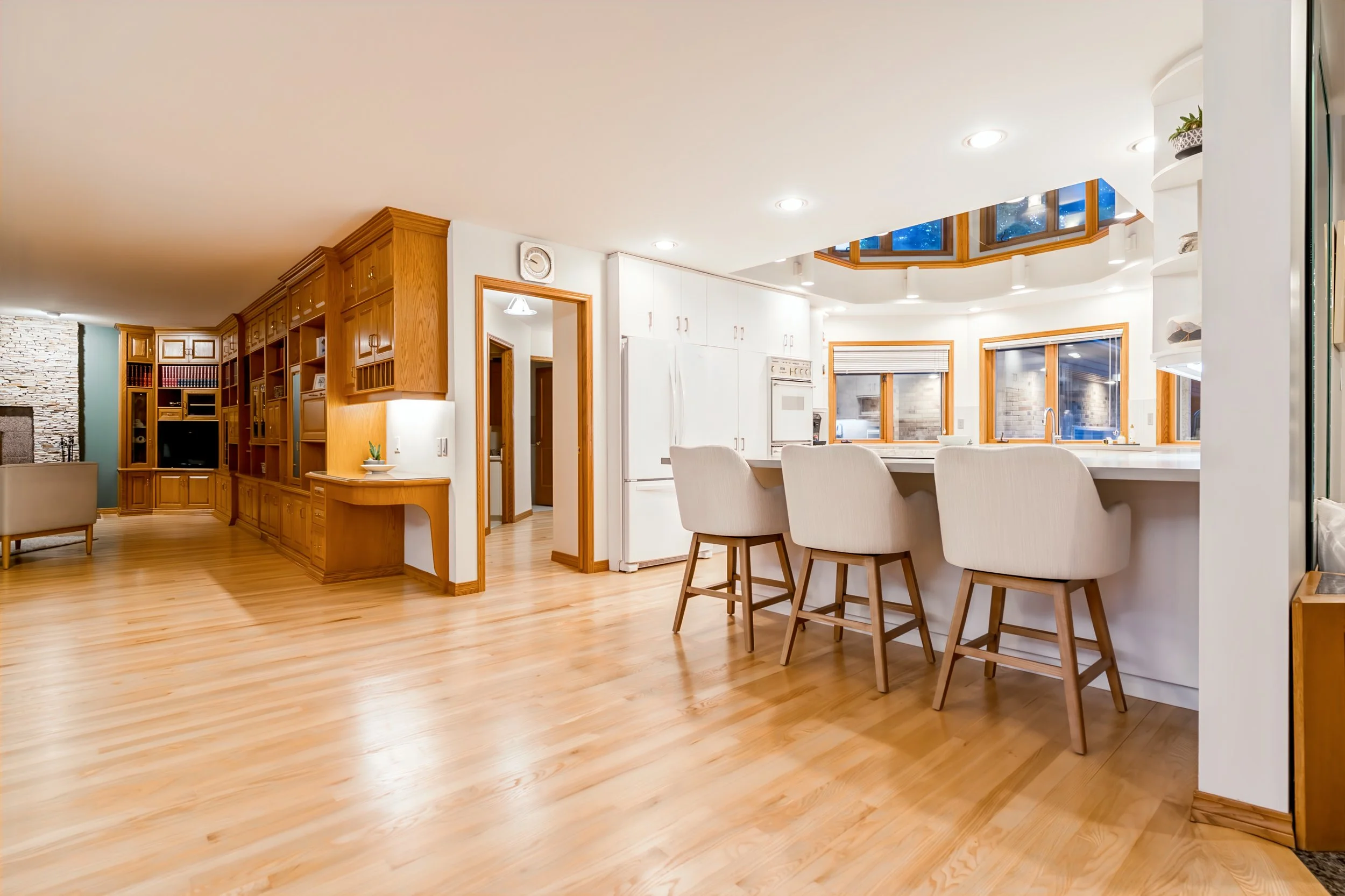 011 Kitchen with soaring double-height ceiling and river views luxury realtor.jpg