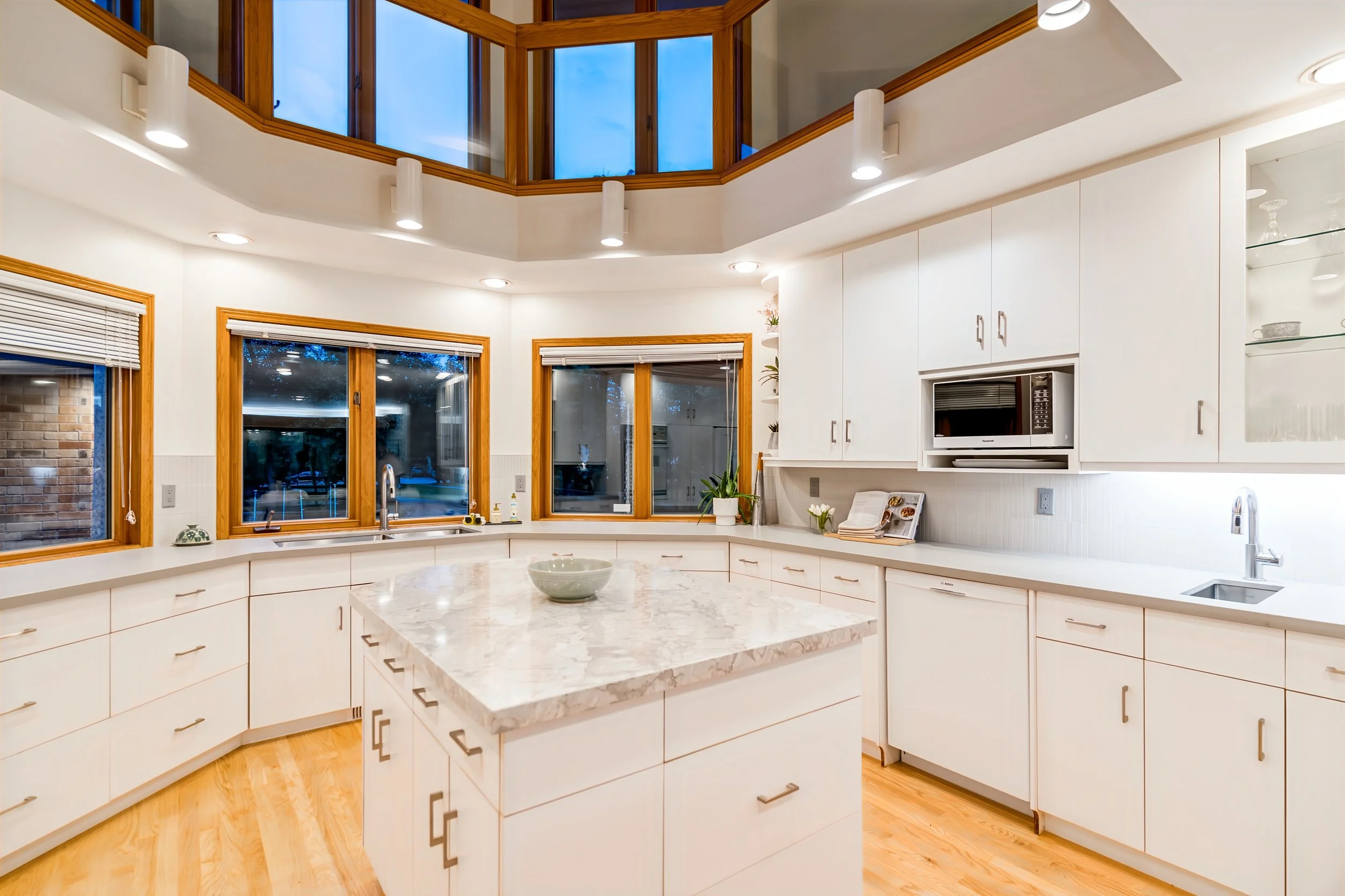 014 Kitchen with double-height volume and timeless finishes winnipeg.jpg
