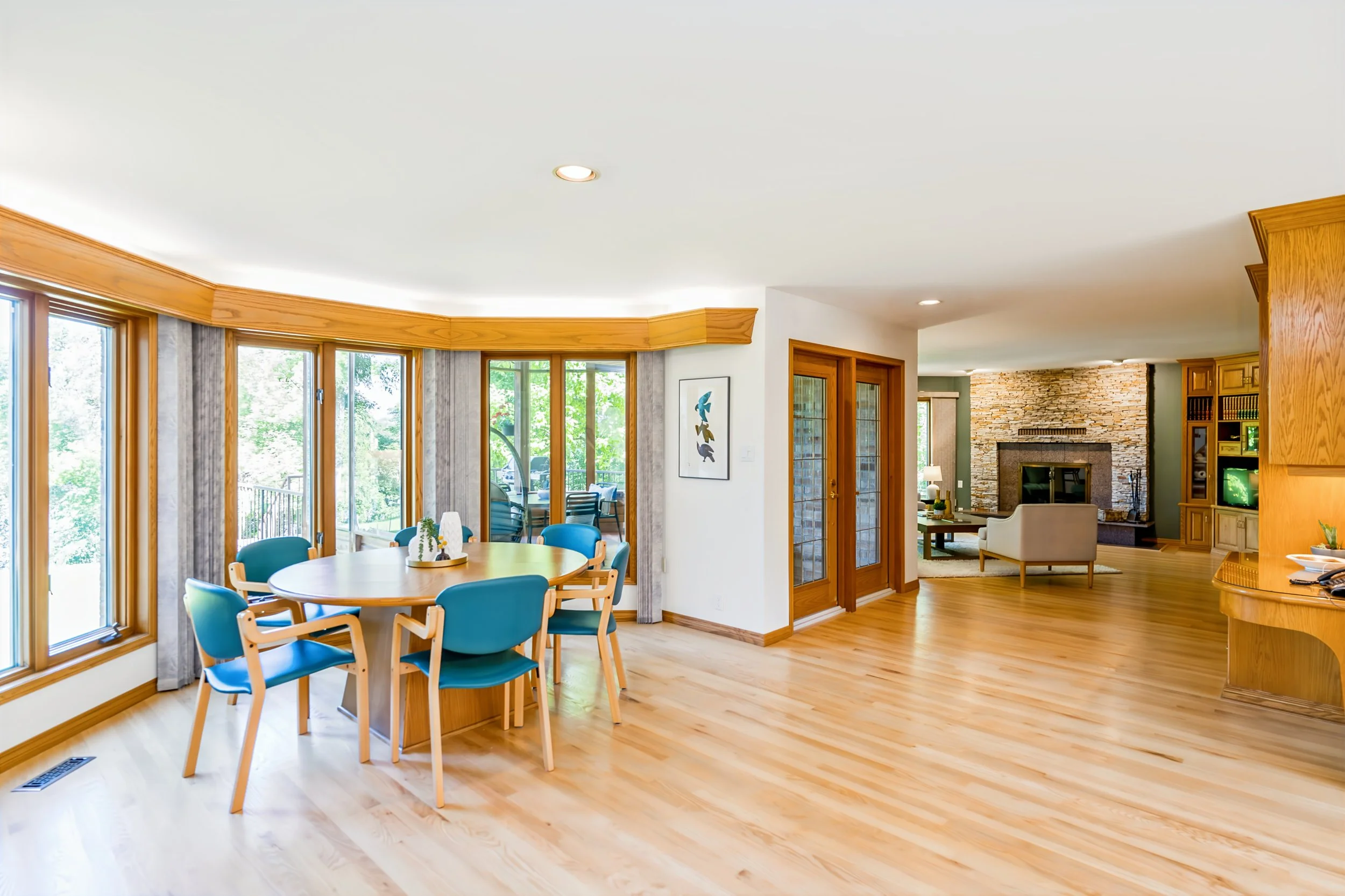 025 Open kitchen and dining area in custom riverfront home.jpg