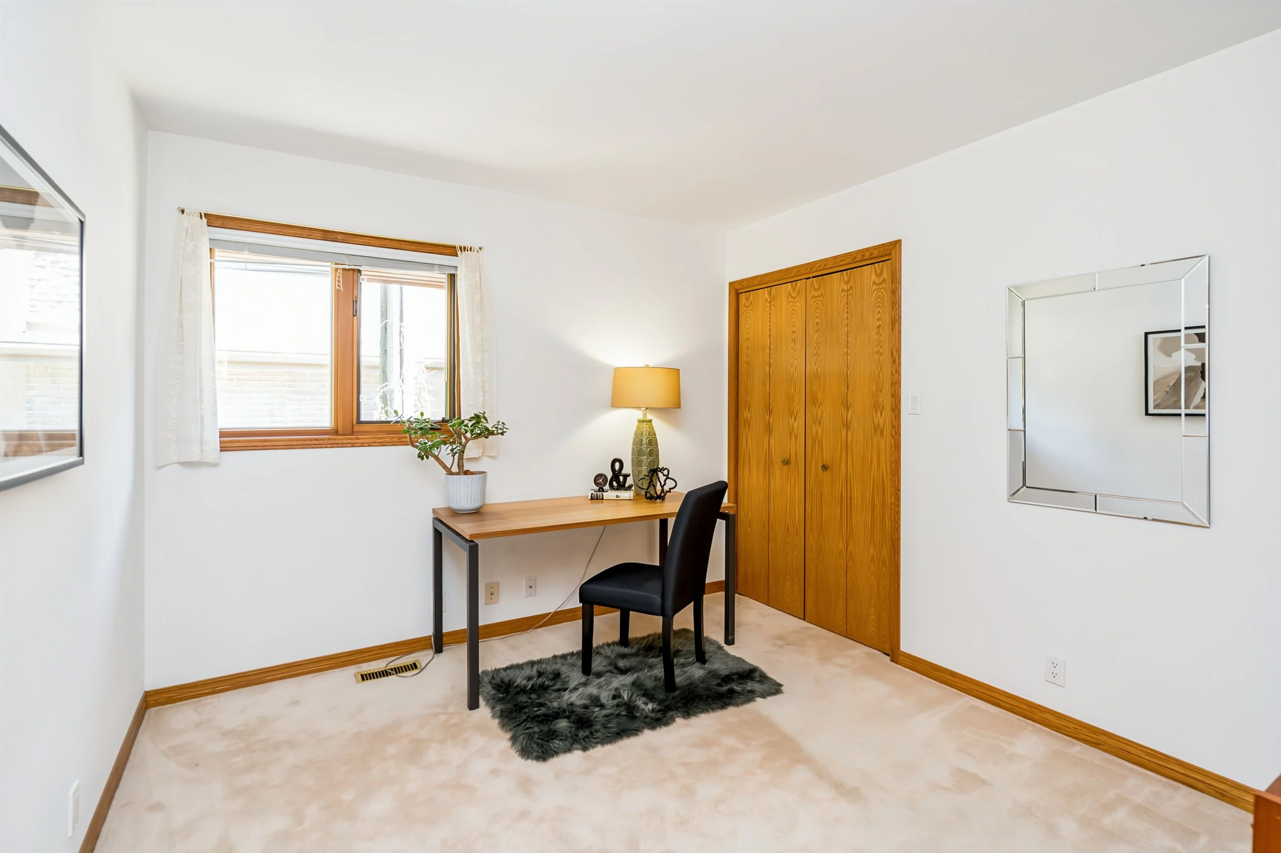 042 Office or potential fifth bedroom on main floor.jpg