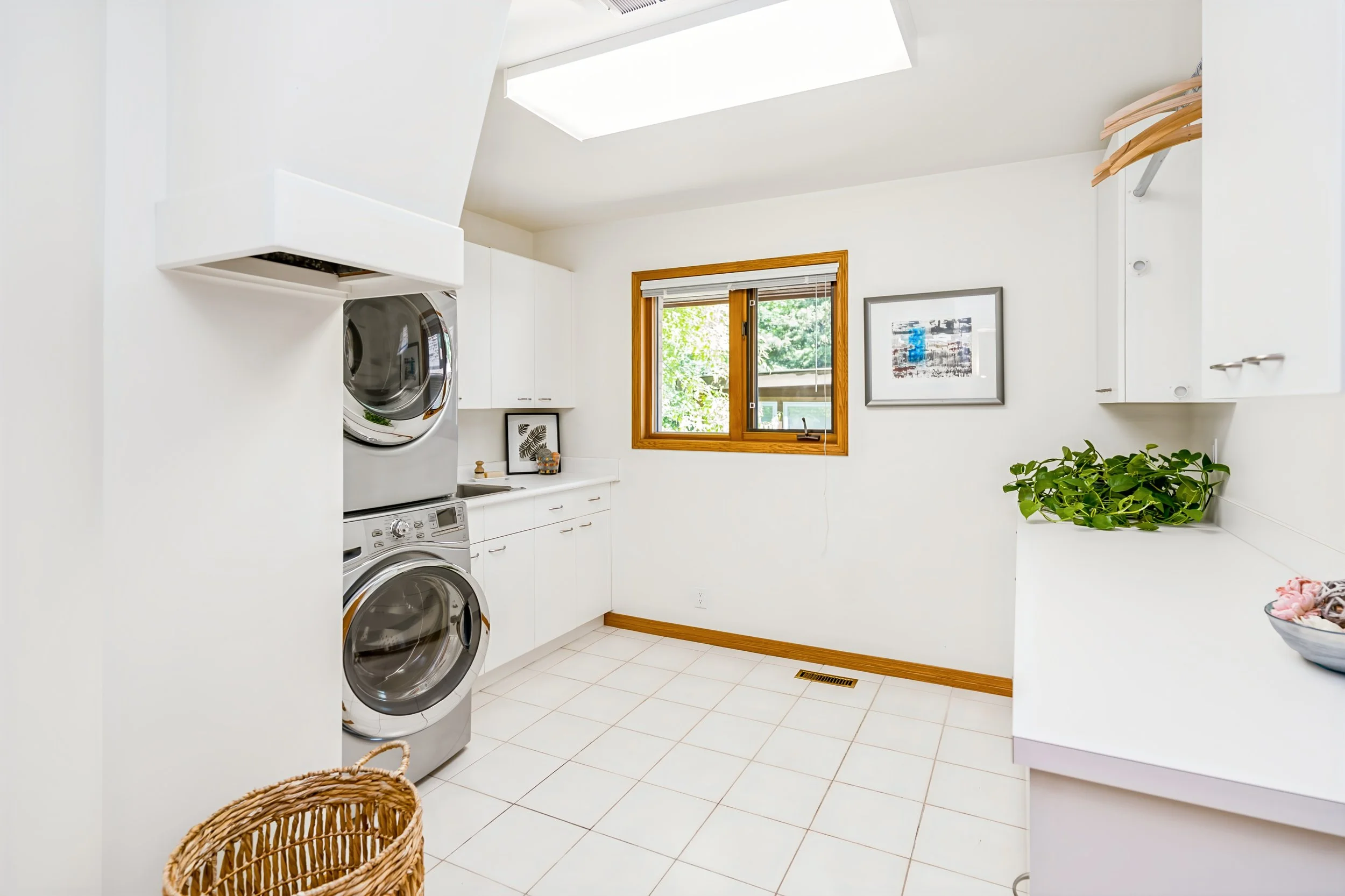 043 Main floor laundry room with convenient second-floor chute.jpg