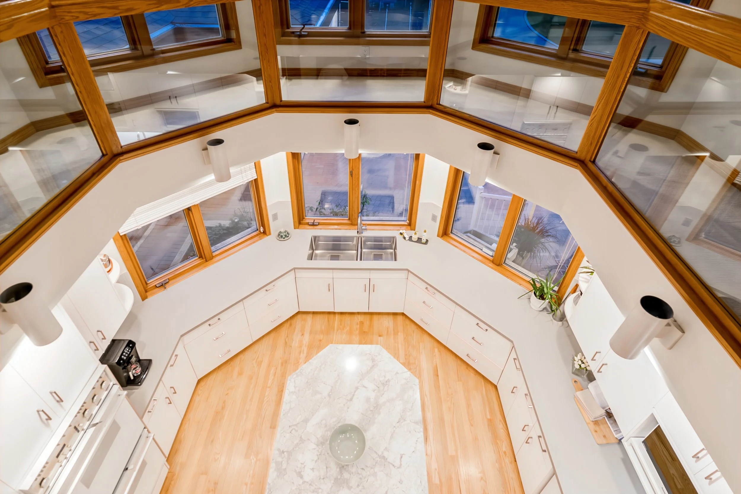 052 Double ceiling height kitchen in luxury winnipeg home.jpg